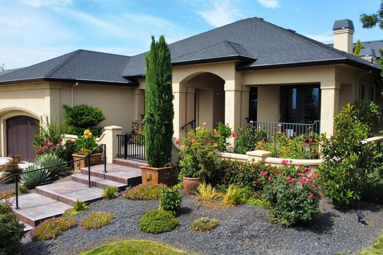 One-of-a-kind Tuscan-style masterpiece in sought-after Summerfield! This ultra-custom home features a split floor plan with 3 bedrooms plus an office and is filled with high-end finishes and thoughtful details throughout. Enjoy beautiful views from the front entry courtyard with stamped concrete and an iron gate. Inside, you'll find high ceilings with exposed beams, Italian paver tile floors, and custom built-in cabinetry in the great room, office, breakfast nook, butler's pantry, and master closet. The chef's kitchen boasts Thermador appliances, double ovens, a built-in refrigerator, granite counters, and walnut butcher block island, The luxurious primary suite offers heated floors in both the bathroom and walk-in closet. Cozy up to gas fireplaces in the great room and covered patio, surrounded by lush landscaping, palm trees, wisteria, artificial turf, and a private pergola with hot tub. Truly a rare gem blending elegance, comfort, and timeless design.