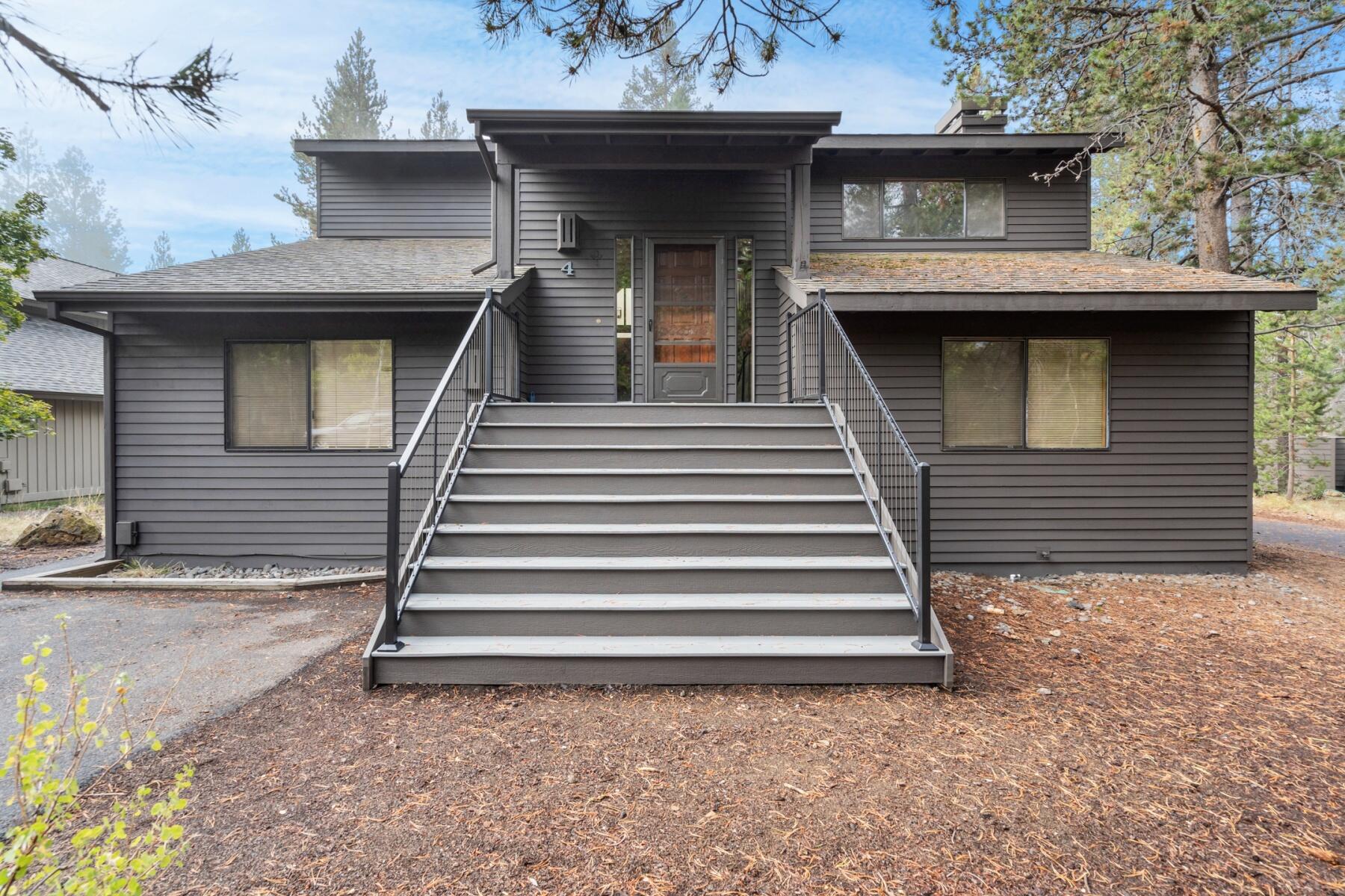 Sunriver is waiting. Outstanding opportunity to own a 4 bedroom / 3 bath home on a quiet street, easy walk to Fort Rock Park or bike to the SHARC and Village. There are 2 master suites, 2 additional bedrooms, one is a large bonus buck room with lots of space for activities, the main body of the home boasts a floor to ceiling stone fireplace, abundance of windows, open floor plan with an additional sun/family room. Private deck with hot tub, and large extended length 2 car garage, long driveway for additional parking and play. Property has all new flooring, new grand entrance, heat pump, water heater, hot tub, decking, new grand entrance, exterior paing and updated furniture package. Home sold furnished.