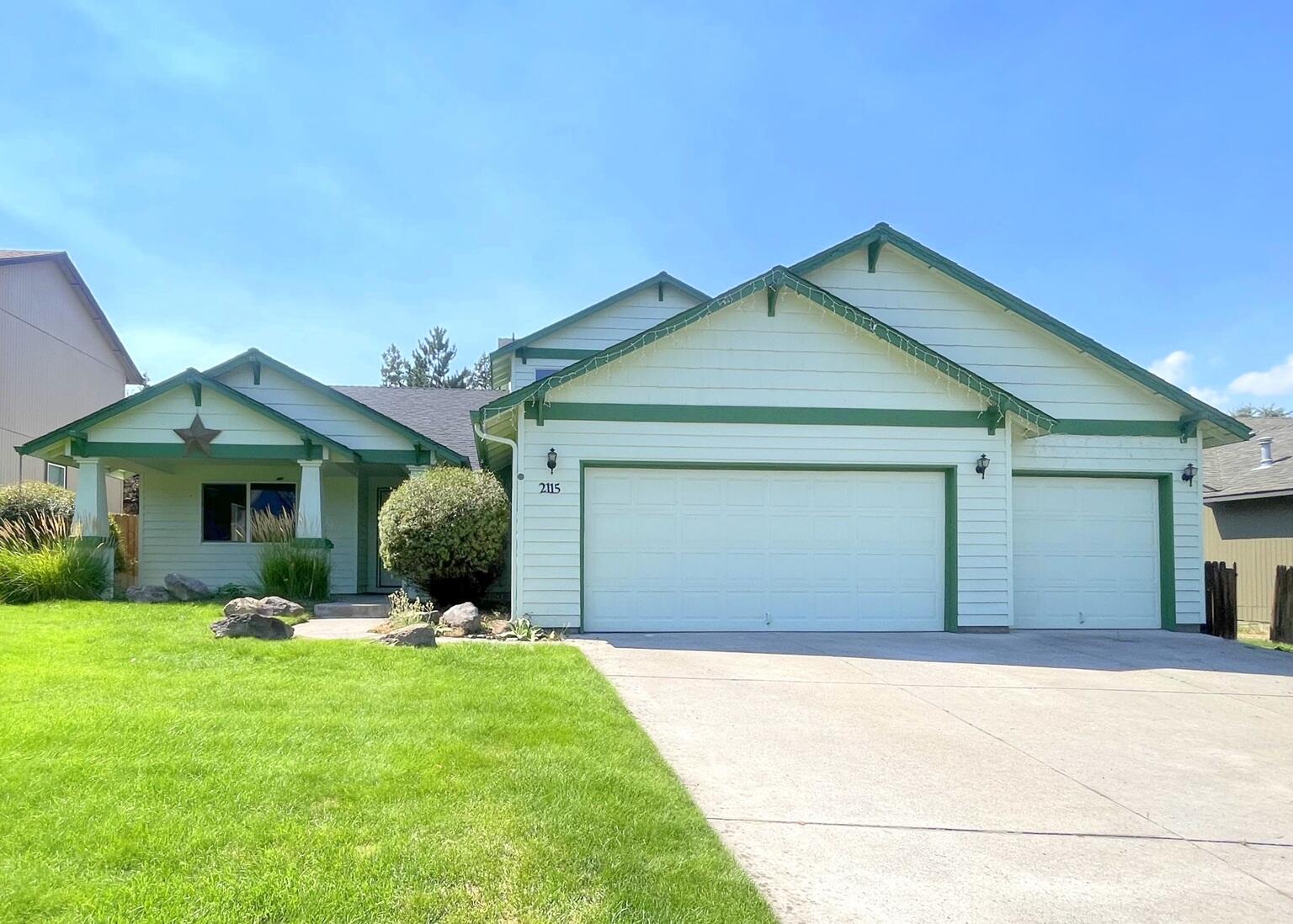 Large home, with 2218 square feet on a larger .23 acre lot with a fenced backyard. Three living areas. Main living space as you enter the home. Large galley kitchen with another living area that has a gas fireplace and a TV/Entertainment space. New flooring in the kitchen, dining and living space. All new kitchen appliances. Tons of cabinets. 4 bedrooms with the primary on the main level. This home has 3 full bathrooms, the primary on-suite, and a guest bathroom on each level. New washer and dryer. Triple garage. New hot tub. Third living area is upstairs. Quiet neighborhood. Don't miss out on this one.