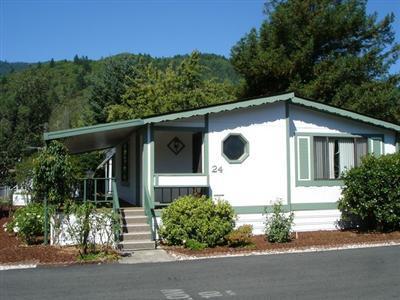 Delightful, open, light & bright 3 bed/2 bath home in the well cared for Parkview Estates Mobile Home 55+Park. Large kitchen & dining combo features rich, warm-toned cabinets, newer vinyl flooring. Beautiful master bedroom suite w/large closets & lg. bathroom, tub/shower. Vaulted ceilings give this home a spacious feel. New roof & paint inside & out. Many new upgrades. Newer shed, w/ little shop & covered carport. One of the largest lots in park. Lots of vegetation, HUGE cherry tree. Beautiful views of surrounding hills from covered deck. Clubhouse & RV parking nearby.
