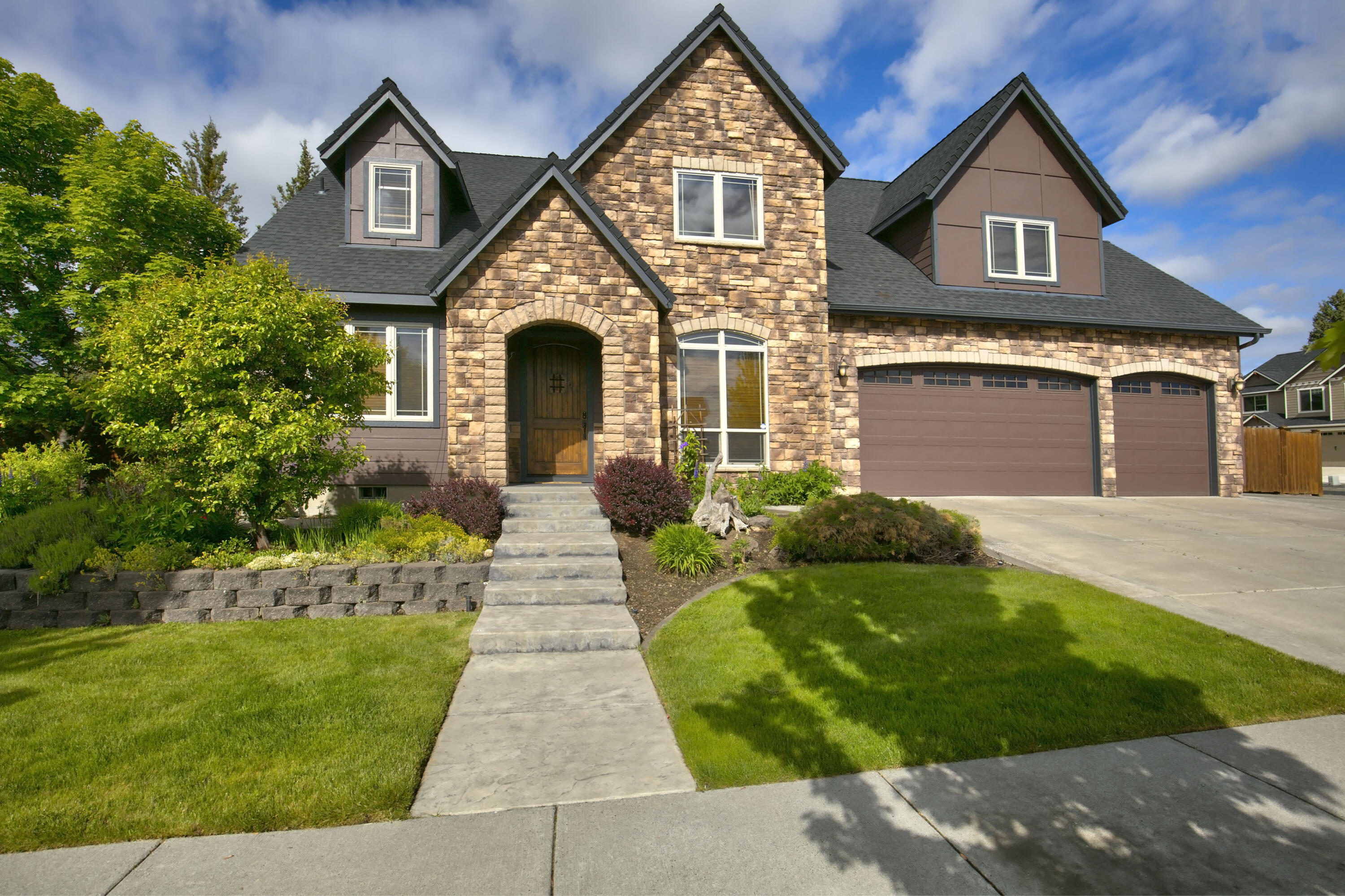 Spacious custom home on a 0.28-acre corner lot in NE Bend! This 3,113 sq ft home offers 4 beds, 3.5 baths, a 3-car garage & RV parking. European-style touches include pecan hand-scraped hardwoods, stack stone gas fireplace & 10' ceilings. Chef's kitchen boasts granite slab counters, large island, 5-burner gas range, double ovens, oversized fridge & butler's pantry w/ wine storage. Main-level primary suite features a jetted tub, stone shower, double vanity, built-ins & patio access to hot tub. Also on main: office, formal dining/flex room & half bath. Upstairs: second suite, 2 beds, large bonus room w/ closet & loft. Fully fenced yard with patio & pergola. Quiet street close to parks, schools, shops & more.