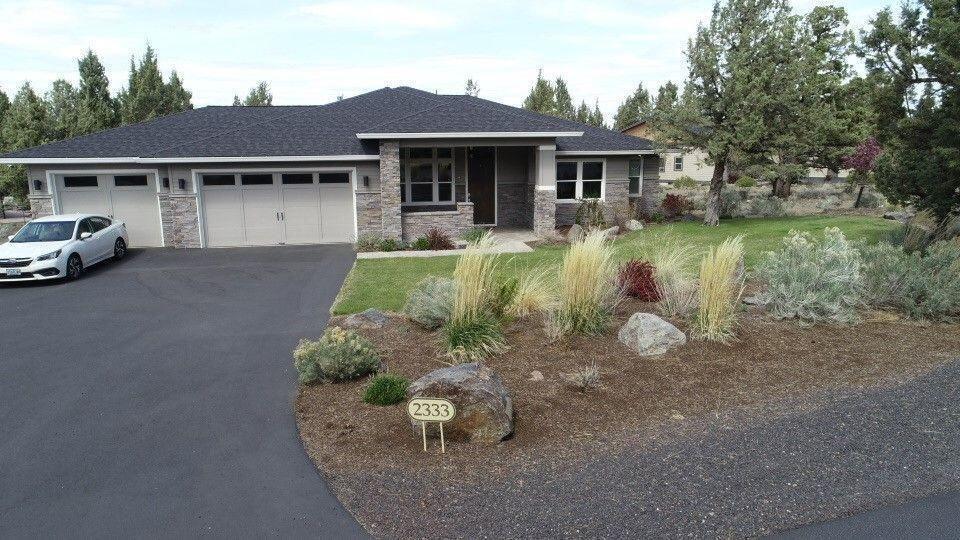 Custom build by the builder for the builder! 4 bedrooms + study and 3 full bathrooms! A chef's kitchen with some newer Viking appliances, granite countertops, huge walk-in pantry deluxe cabinets by Brian's Cabinets in Bend. Giant primary suite with walk-in closet. Primary bath features double sinks, beautiful soaker tub, large, tiled shower with tiled floors. 11' ceilings in the main areas with 8' doors! Big, bright windows look out to the covered terrace with built in stainless grill and side burner. Outdoor TV & soundbar included! Oversized 3 car garage! HOA fees include water/sewer.