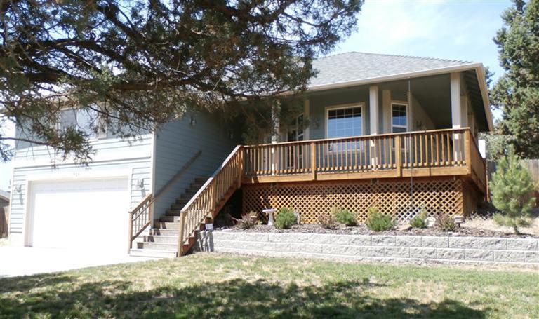 Custom home with covered, wrap-around porch and RV parking. Vaulted living rm with back deck access and pellet stove on slate hearth, open to spacious custom kitchen. Raised breakfast bar, custom cabinets, tile floor and counters. Hardwood floors in entry and formal dining. Separate 24x24 family room. Features include Hardy siding, up/down down/upblinds. Pool, 2 stocked lakes (2 fish/day limit), RV dump site, private dirt bike area and clubhouse. Horse boarding available.