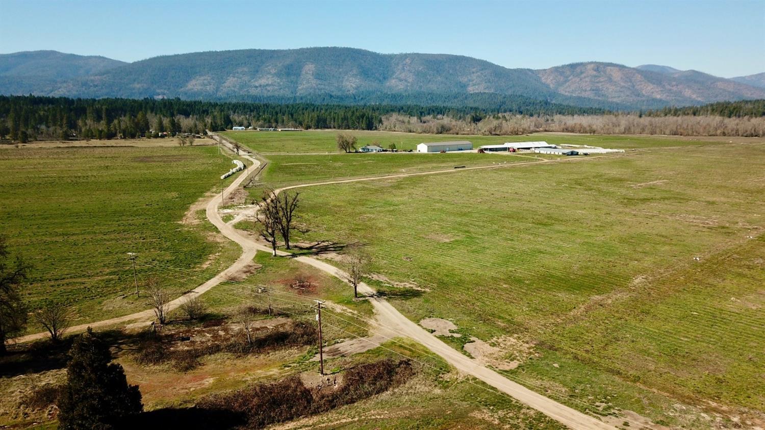 Turn Key Hemp Farm consisting of 394 acres Ag land, Illinois River Frontage & end of the road privacy. One of a kind property boasts 289 acres primary water rights dating back to 1900, 47 supplemental rights and 150 AF storage. 7 legal parcels zoned EFU with additional homesite possibilities. 2019 improvements to the property include; 50'x200' Butler building w/20' sides and pallet racking, Remote Irrigation controller, monitor and moisture sensors, 2 hemp harvesters, 2 ranch mules, Combine, Seeder, nutrient injection system and renovation to the 2190sf 4 bed/2 bath ranch home. To much to list. (2) 75hp pumps, underground irrigation, wheel lines, sprinkler and drip system included. 1200 amps of power on property w/ electrical upgrades at pump house and outbuildings. Owner carry terms available to qualified buyer. Appointment Only. All information deemed reliable, but not guaranteed. All information should be independently verified.