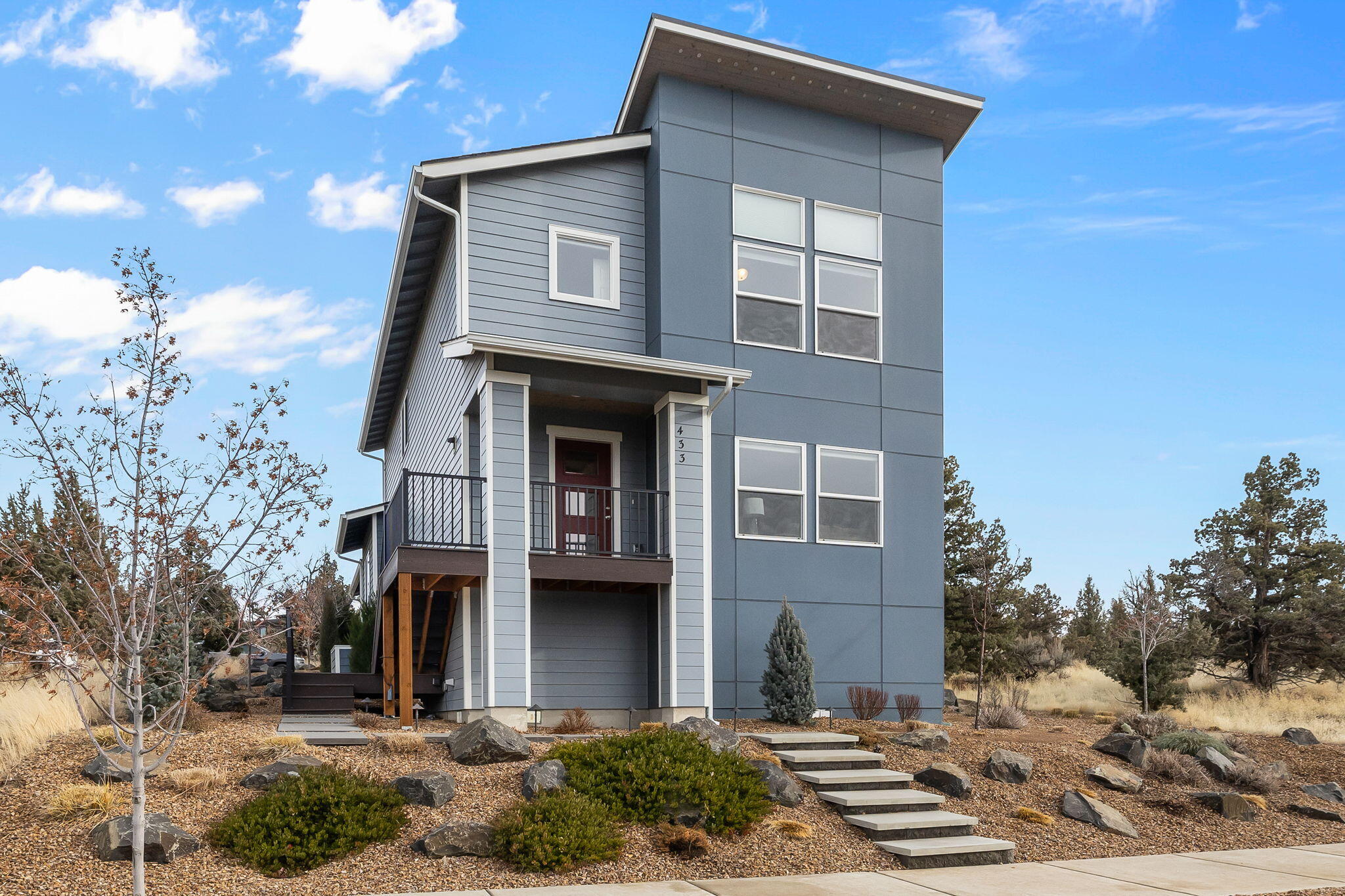 Dramatic views of seven Cascade peaks from this three-year-old, lightly lived in home located in the Yarrow Neighborhood. Main level great room with living and dining areas. Kitchen includes island with breakfast bar. Main level also includes one bedroom and a full bath. Upper-level primary suite also has beautiful Cascade views. Primary Suite includes full bath with dual vanity and walk-in closet. Upper level also has two additional bedrooms, open loft area, and a 3rd full bath. Landscaping is low maintenance xeriscape with drip system. Convenient alley access to garage. Garage has installed EV charging system. Concrete walkway to back porch entrance. Property has been used on a part-time basis. Homeowner has purchased 1-Year Home Warranty from American Home Shield. Earth Advantage Certified Home.