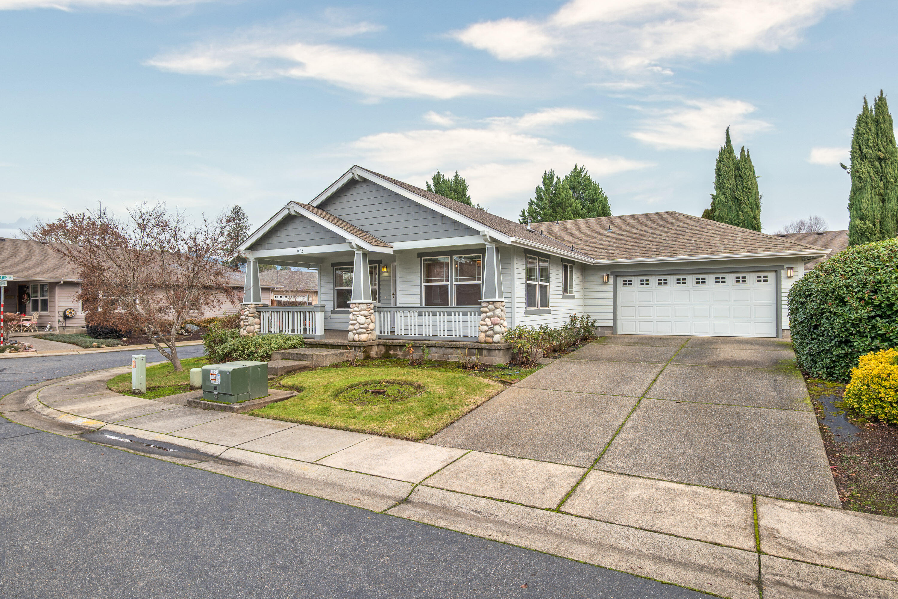 Located in a desirable 55+ community, this well-maintained 2 bedroom, 2 bath home with a bonus room offers 1,192 sq ft of comfortable living space. Built in 2000 and situated on a .13-acre lot, the home features brand new HVAC, new flooring, fresh interior paint, and a new oven/range. The functional floor plan provides flexibility for a home office, hobby room, or guest space. HOA covers water, sewer, common area maintenance, and RV parking. Enjoy close proximity to the Rogue River, along with easy access to shopping, dining, and medical services. Low-maintenance living in a peaceful setting—schedule your private showing today and experience it for yourself.