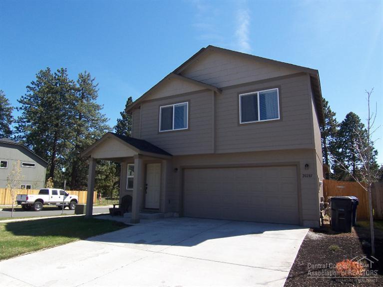 Move In Ready! Nearly new charming home with a spacious greatroom floor plan includes vaulted ceilings, gas fireplace w/tile surround and opens to the kitchen and dining area. Kitchen features darker cabinets, tile backsplash and center island with raised bar. 3 bedrooms and laundry upstairs. Better than new, everything is done for you including large back patio, landscaping, sprinkler and fully fenced. Very nice home situated on a corner lot and conveniently located nearby shopping center.