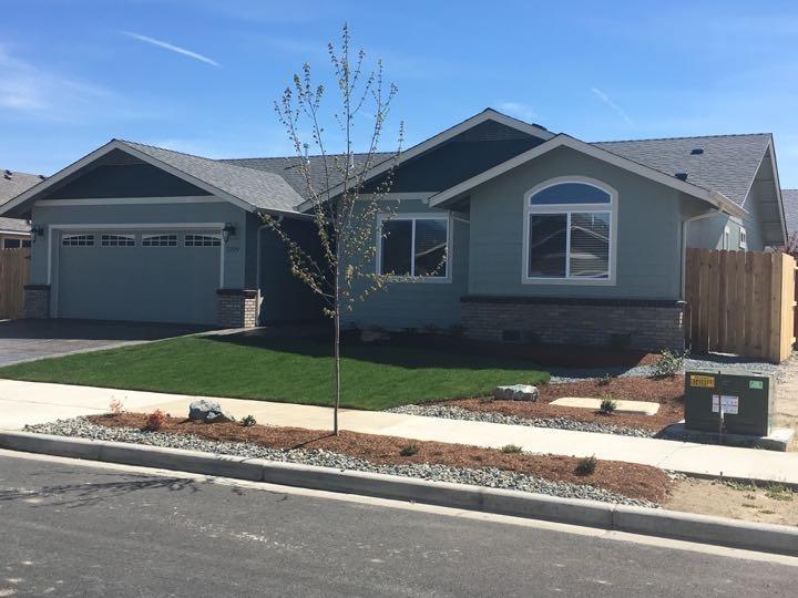 Brand new home in a brand new Subdivision. large Homes and large lots many with room for RV parking and spacious back yards. Totally upgraded home for an entry level price with all the best including hardwood floors, custom cabinets and appliances. Vaulted and/ or coffered ceilings. Extreme energy efficiency throughout. Beautiful landscape package and fully fenced. Attention to detail in every nook and cranny. Lots of custom finish work and either stone or brick accents outside. Come visit this home and you will buy it today, Ask about other lots and plans. This is a custom version built to the buyers specifications.