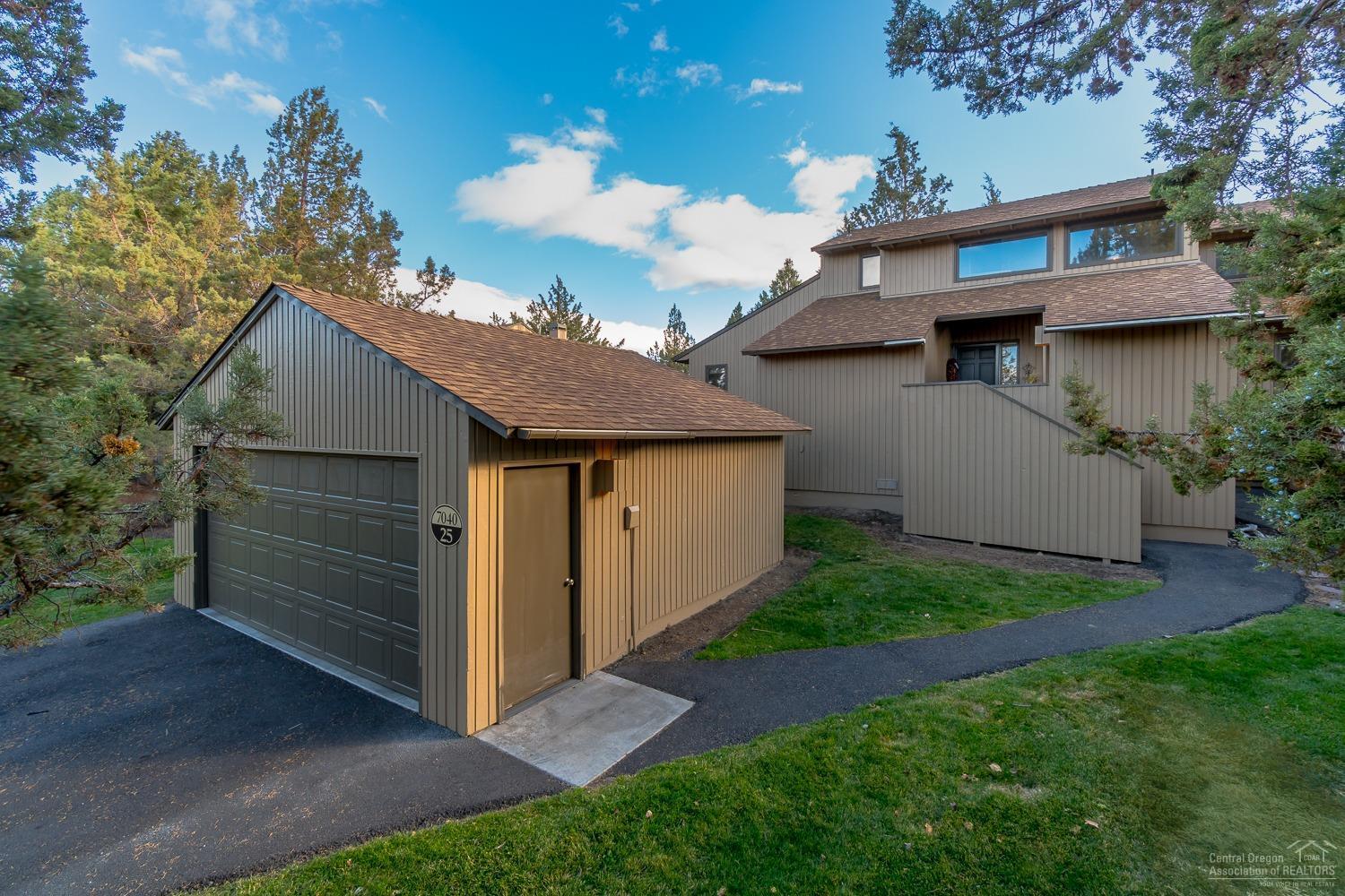 Carefree lifestyle for you in this beautiful townhome on tenth fairway of Resort Golf Course at Eagle Crest. With private setting, 3 bed/2 bath home, w/ 2 bedrooms on main floor and master suite upstairs, 2 car garage, this unit would make a great full time residence or vacation spot. Excellent maintenance. HOA takes care of pesky exterior maintenance freeing you to enjoy the good life! Many amenities in three sport centers, three golf courses, hiking and bike paths, swimming pools and more. Local area is rich recreation. This 1405 sf home is 3 Bed, 2 Bath, 2 car detached garage, with many updates. New Updates Inc: Wood floors, appliances, all decking, exterior/interior paint, backflow system, pressure tank on main water heater, faucets and water supplies beneath faucets, closet organizers, entire crawlspace insulation, and crawlspace vents... heat pump/AC, forced air. This home also has a private driveway (not shared).