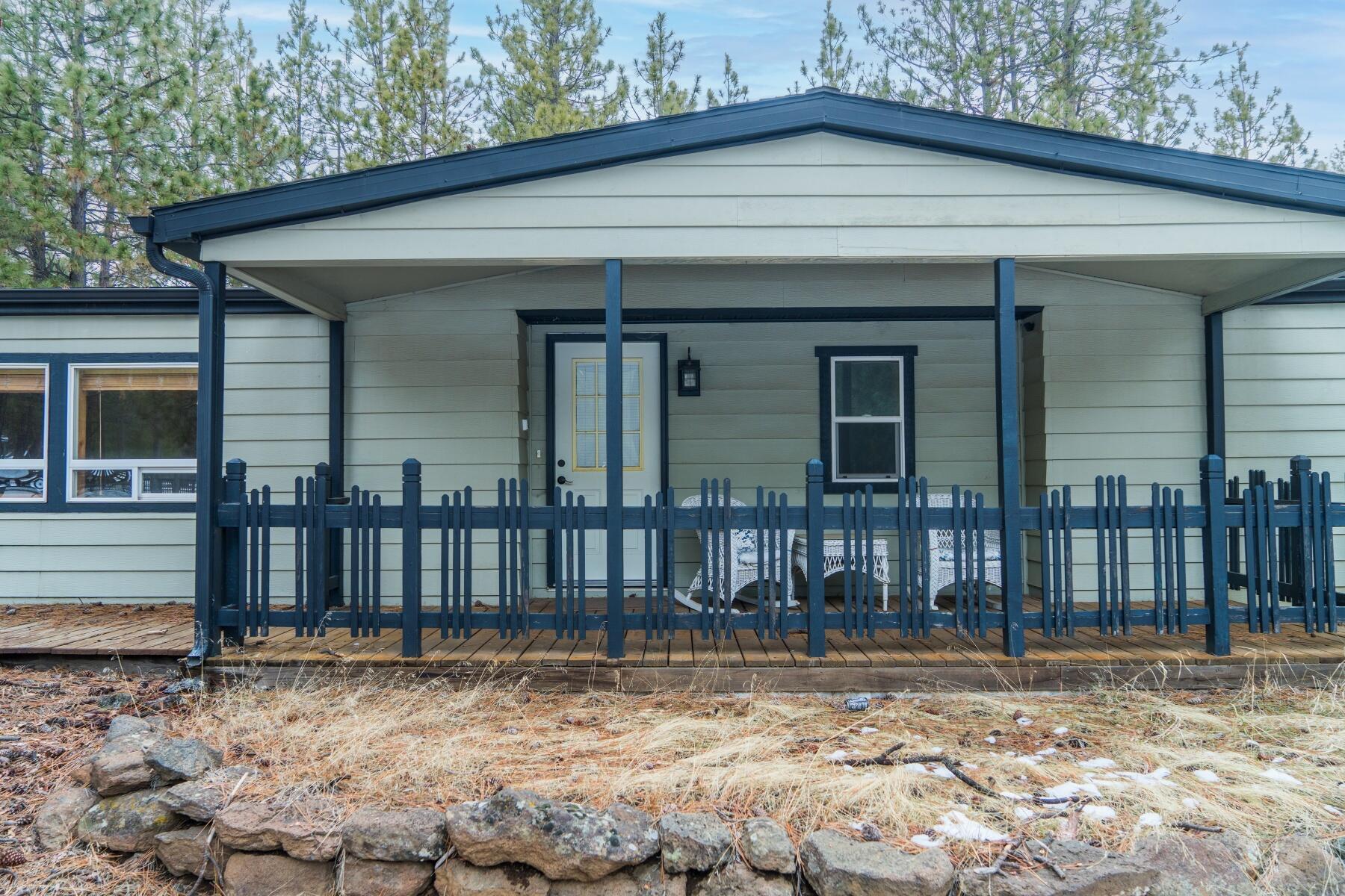 Welcome to 14736 Bluegrass Loop, a beautifully updated 3-bedroom, 2-bath home on nearly an acre of peaceful countryside. This thoughtfully renovated home blends rustic charm with modern touches, featuring warm knotty pine interiors and oversized windows that invite natural light and scenic views.  

The spacious living area is perfect for gathering, while the updated kitchen and cozy pellet stove in the dining area add warmth and comfort. Step outside to relax on the covered front porch or entertain on the expansive rear patio within the fenced yard.  

Need extra space? The 1,152 sq. ft. multi-use garage/shop offers endless possibilities—workshop, storage, or a creative retreat.  

All this, just minutes from Sisters, offering the perfect blend of country living and convenience!