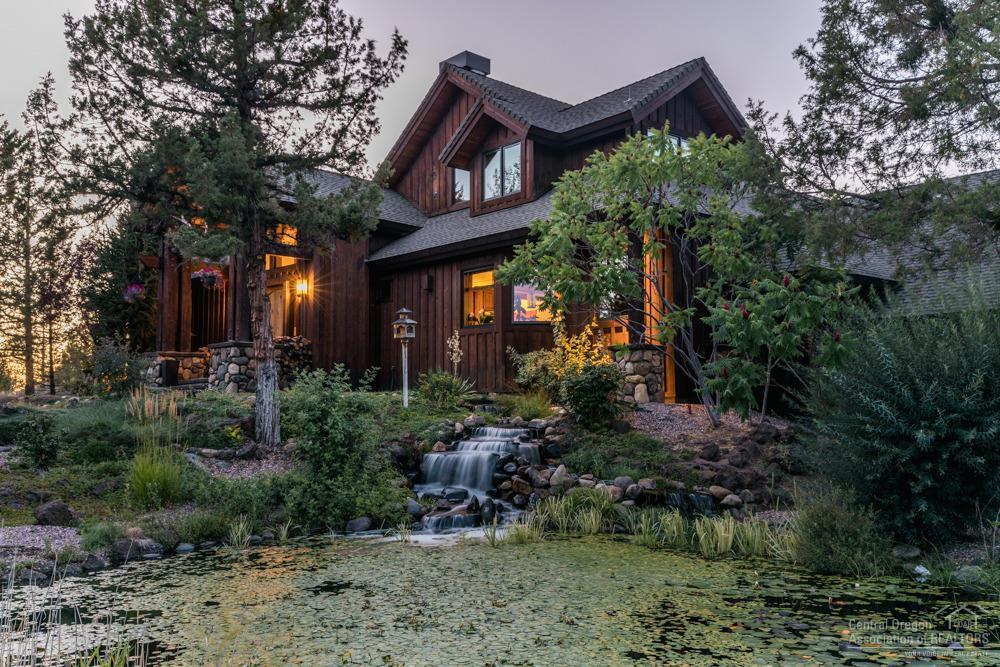 This beautiful NW style home has it all, nestled between Bend & Tumalo on 10 acres where you will never want to leave your custom home featuring over 3000 sq ft of open living. The master bedroom on the main floor makes for easy living & you will have room for all your toys either in the 3 car garage or 3 bay shop. A 2 stall barn with tack room & fenced area to roam, completes the package on this amazing property. Enjoy the Cascade mountain views while you relax outside to the sound of a nearby waterfall.