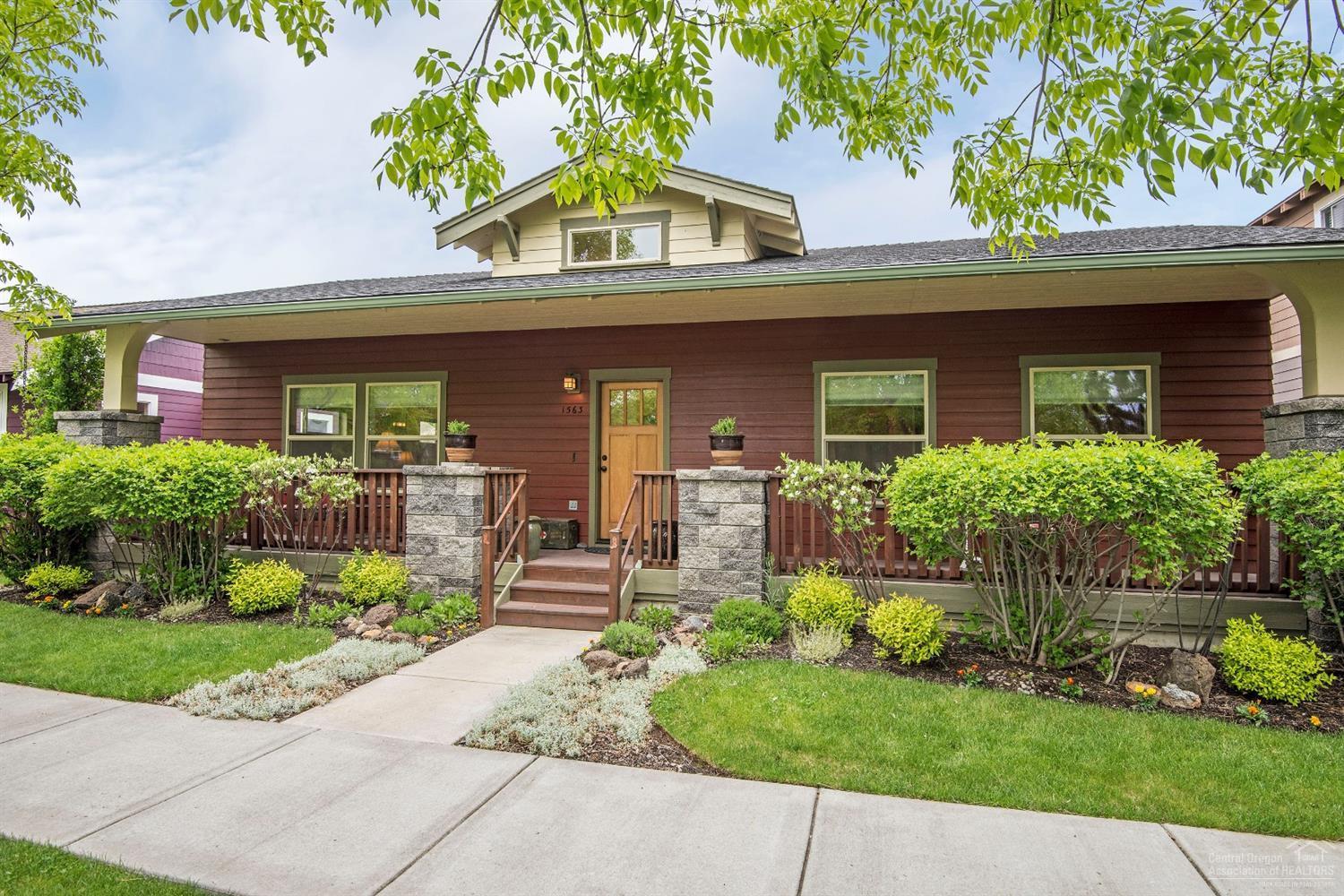 Enjoy your morning coffee on your roomy & private front porch, or evening BBQs on your big back covered deck, overlooking your spacious fenced backyard in this adorable and well-maintained bungalow home! Lightly lived in as a 2nd home for snowbirds, this charming single level home offers many upgrades with sand-in-place hardwood floors, new solid surface (granite) counters in Kitchen and bathrooms, new Kitchen appliances (2017), oversized 2-car garage w/ access to backyard. You'll love the 2-sided fireplace between the Great Room and Kitchen! Master Bath offers split vanities, soaking tub, walk-in shower and walk-in closet with a comfortable office/work space nestled in the closet. Washer/dryer, and back patio furniture included. As well, most all furnishings can be purchased outside escrow for a truly turn-key, move-in ready purchase! CLA for details.