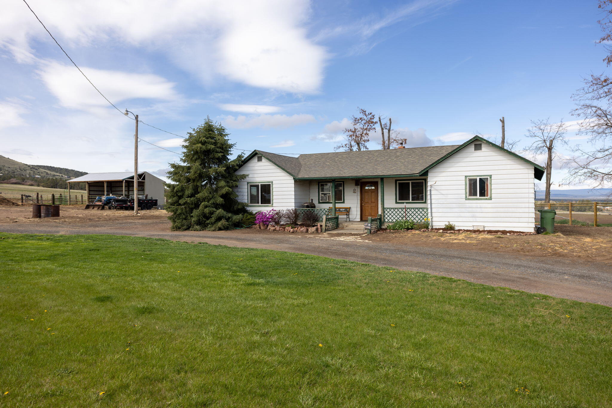 Gorgeous mini farm located in the Culver School District and just minutes from town! This beautiful property boasts 3.7 acres with water rights, making it perfect for a variety of agricultural pursuits. The property features new fencing and stunning Cascade mountain views, providing a peaceful and serene setting. Horse lovers will appreciate the well-maintained horse stalls, and the property is also ideal for raising livestock or growing your own food. With its convenient location just 20 minutes from Redmond, this mini farm offers the perfect balance of rural living with easy access to urban amenities. Don't miss out on this incredible opportunity to own a piece of paradise!