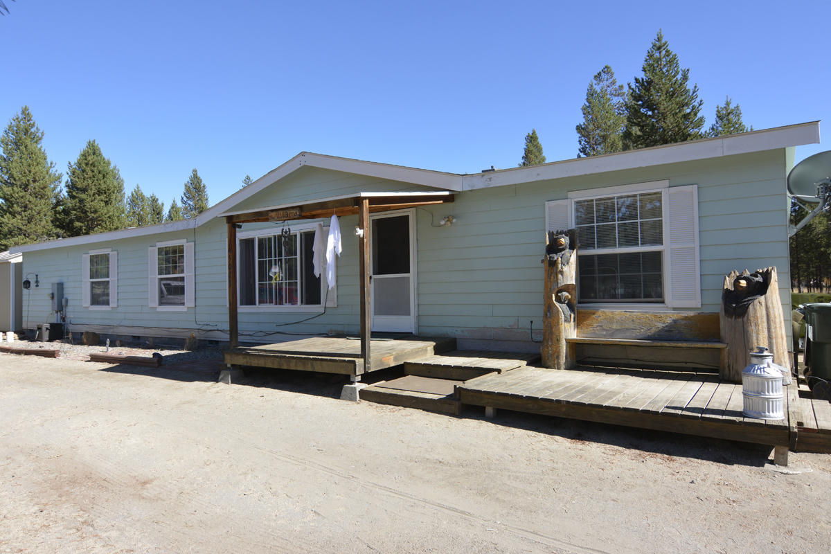 Located in Central Oregon just minutes to La Pine sets this 3 bedroom plus and office single level home with over 1780 SF setting on a level fenced 1 acre corner lot. Large open vaulted living room with lots of windows looking out to the trees. This home has a very large kitchen with oak cabinets, lots of counter space, large dining area, oversized master bedroom with a soaking tube and a shower. 2 other vaulted bedrooms. Double paned vinyl windows throughout. 2 Patios, sitting areas one oft front and one in the back fenced yard, raised flower beds, covered front porch, circular driveway, storage shed all for under $250,000.