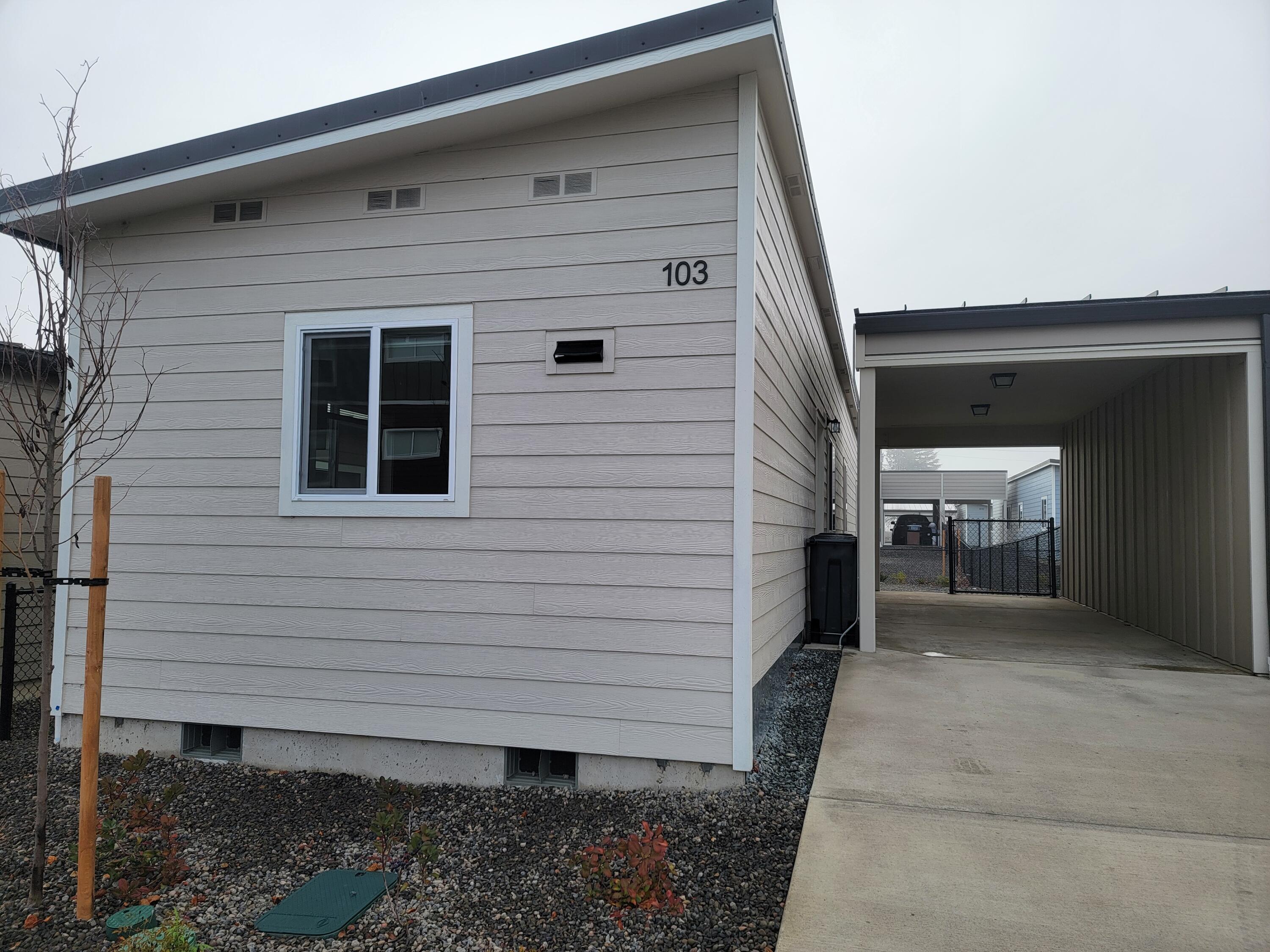 Brand new 2025 mobile home in a great park setting. Exterior has clean lines with fresh siding and a covered car port. Interior feels bright and untouched.  This 2 Bedroom 1 bath home has an open layout to make good use of the space. Simple yet comfortable and ready to move in.