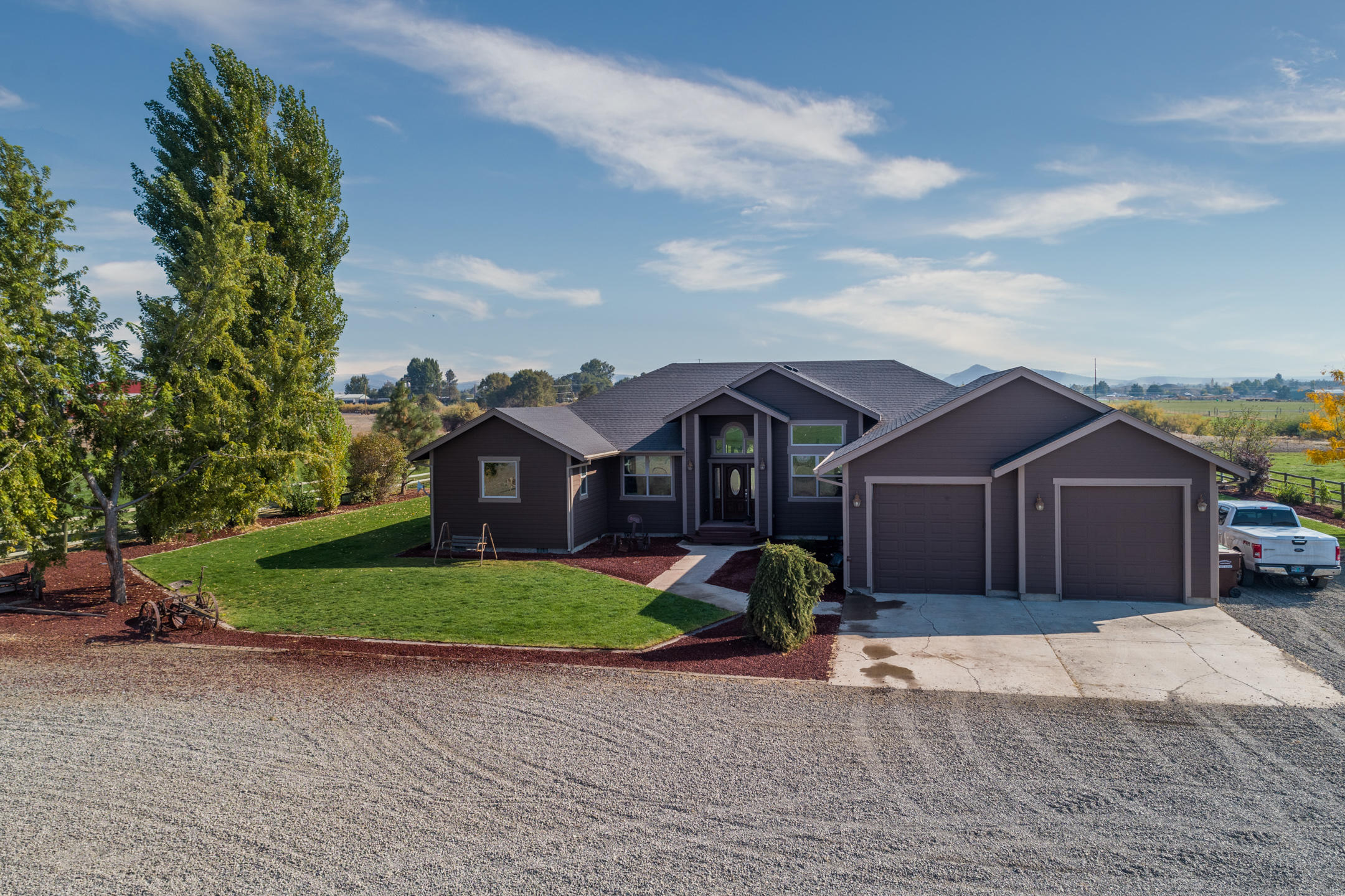 Unique McKay Creek frontage small acreage property with gorgeous 2800 sq ft custom built home tucked off the Prineville/Madras Hwy. Extremely private and quiet setting. Vaulted ceilings throughout to give that extra spacious feeling. Extra large master bedroom with large bathroom and walk-in closet. Huge kitchen with island open to the breakfast nook and great room. Beautiful back yard with fully covered trex deck, great for entertaining. 26+ irrigated acres that produced 65 tons of hay this summer. Hay storage building with 4 stalls attached. Nice 40x48 detached shop with 220 v and an oversized 2 car garage attached to the house. Come enjoy all Central Oregon has to offer!