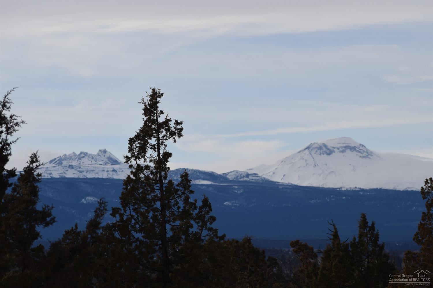 Extremely unique elevated, buildable parcel w/magnificent Cascade Mountain views in the desirable Tumalo community just minutes from the Deschutes River. Located conveniently between Bend &amp; Redmond, this rare gem offers the perfect opportunity to build your dream home. There are several site options, all of which feature stunning unimpeded views &amp; sit back from the road to offer highly desired privacy. Many mature juniper trees, &amp; unique deciduous trees not native to C O that have thrived on the lower portion. Lots of wildlife in the area including deer, owls, eagles, hawks, &amp; more. Huge decorative natural boulder outcroppings make up a large part of the hillside providing tons of character &amp; homes for wildlife. The fact that the property has remained relatively untouched for years has happily contributed to the presence of wildlife. In addition, there are several signs of past inhabitants, evoking a sense of history, imagination &amp; wonder about who else might ha