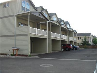 Zoned Multi Family. Surrounded by beautiful Newtown homes. Clear the old house off the lot and build an income property! Great opportunity. Buyers to do due diligence with Central Point City on removal and ability to rebuild.