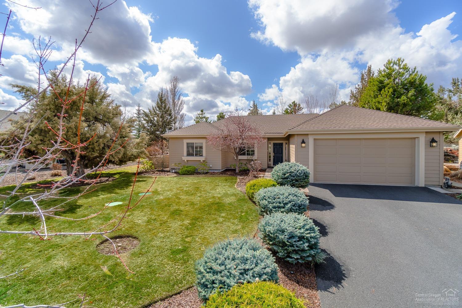 Beautiful single level home located in The Falls 55+ community in Eagle Crest Resort. Open concept floor plan with two bedrooms, two baths, plus den. Great room with gas fireplace overlooking private backyard and expansive paver patio. Master suite with spacious walk-in closet, enclosed water closet, and walk-in shower. Kitchen with island, breakfast bar, pantry, and tile floors. Updated range, dishwasher, sink and faucet. Residents of The Falls enjoy access to a private 6000 square foot community clubhouse equipped with a large kitchen, great room with library, game room, craft room and exercise room. This clubhouse is the hub for many social gatherings and celebrations. Eagle Crest Resort boasts three 18 hole golf courses, fitness centers, a spa, horseback riding, tennis, pickleball, basketball, miles of trails for hiking and biking, and dining establishments. Home exterior painted in 2017.