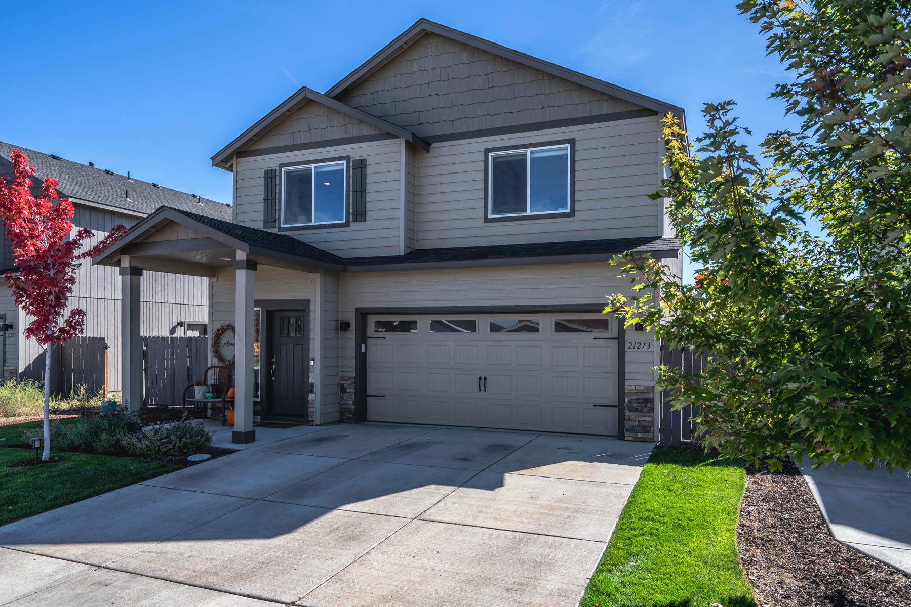 Welcome home! You will be impressed with this attractive home. Primary bedroom on the main level with access to the fun and spacious backyard. Great room plan features engineered Bamboo flooring and gas fireplace. 2nd level offers 2 bedrooms, guest bath and a light and bright flex space, perfect for the home office. The backyard is complete with a large concrete patio and lush green yard. It is south facing and would be a great potential place for a gardener. Centrally located and close to Costco.