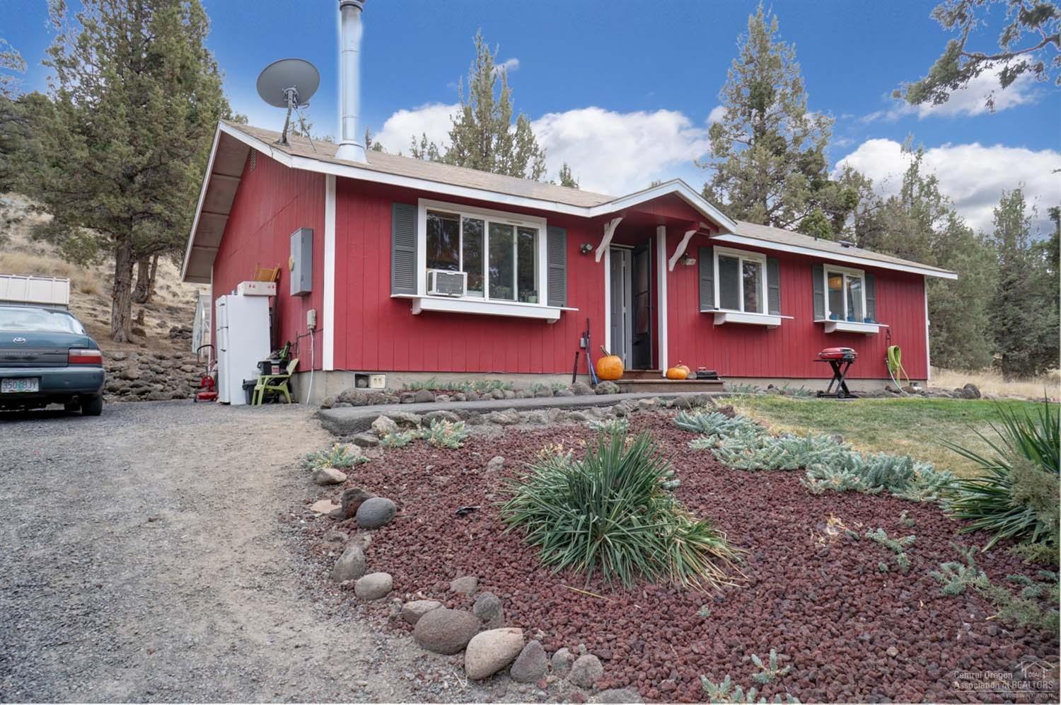 Perfect retreat for writers or fishermen. Close to the Deschutes River with spectacular canyon views. Easy access to the river for fishing, rafting, hiking, horseback riding. Well maintained 3 bedroom 2 bath home on 1.09 peaceful acres. Property also includes a playhouse, hobby shed with power and outbuildings. Newer floor coverings, hot water heater, paint, light fixtures, disposal, window screens, wood stove hearth. Seller is an Oregon real estate broker.