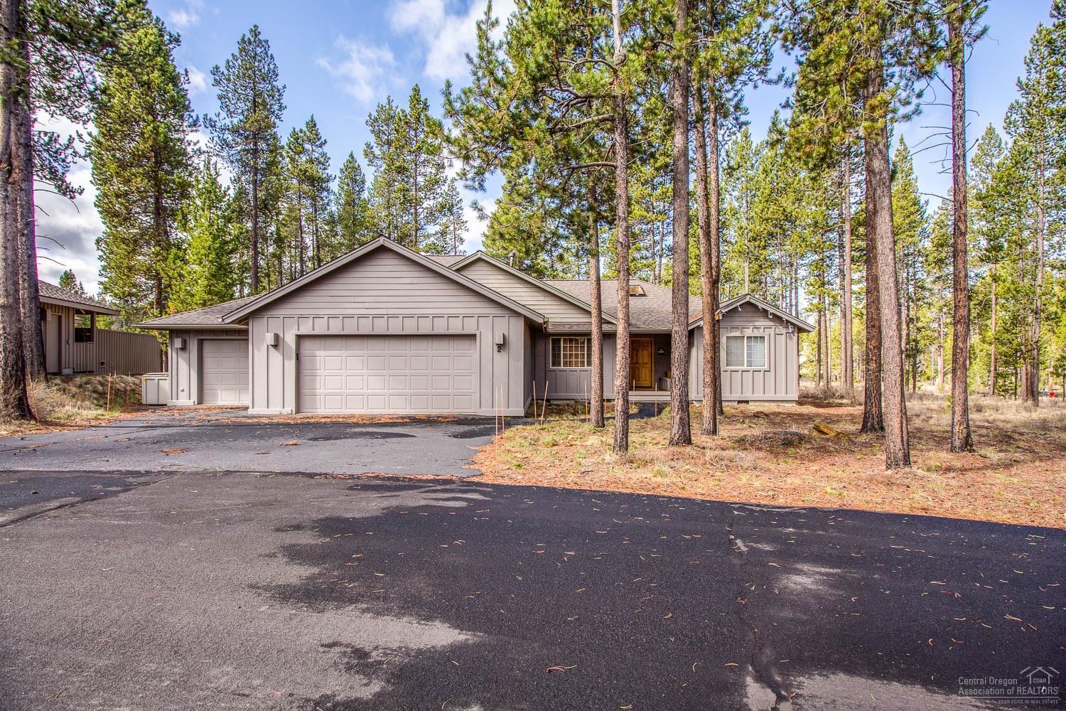 This is a one owner single floor home built by Bob Schumacher in 1996. This home has 4 bedrooms (one currently used as large family room), 2 baths, 3 car garage, large great room with river rock gas fireplace. This home comes turnkey furnished and has never been rented. The home has had very little use and is in great condition. The 3rd garage is a lockout garage, perfect for owner storage.