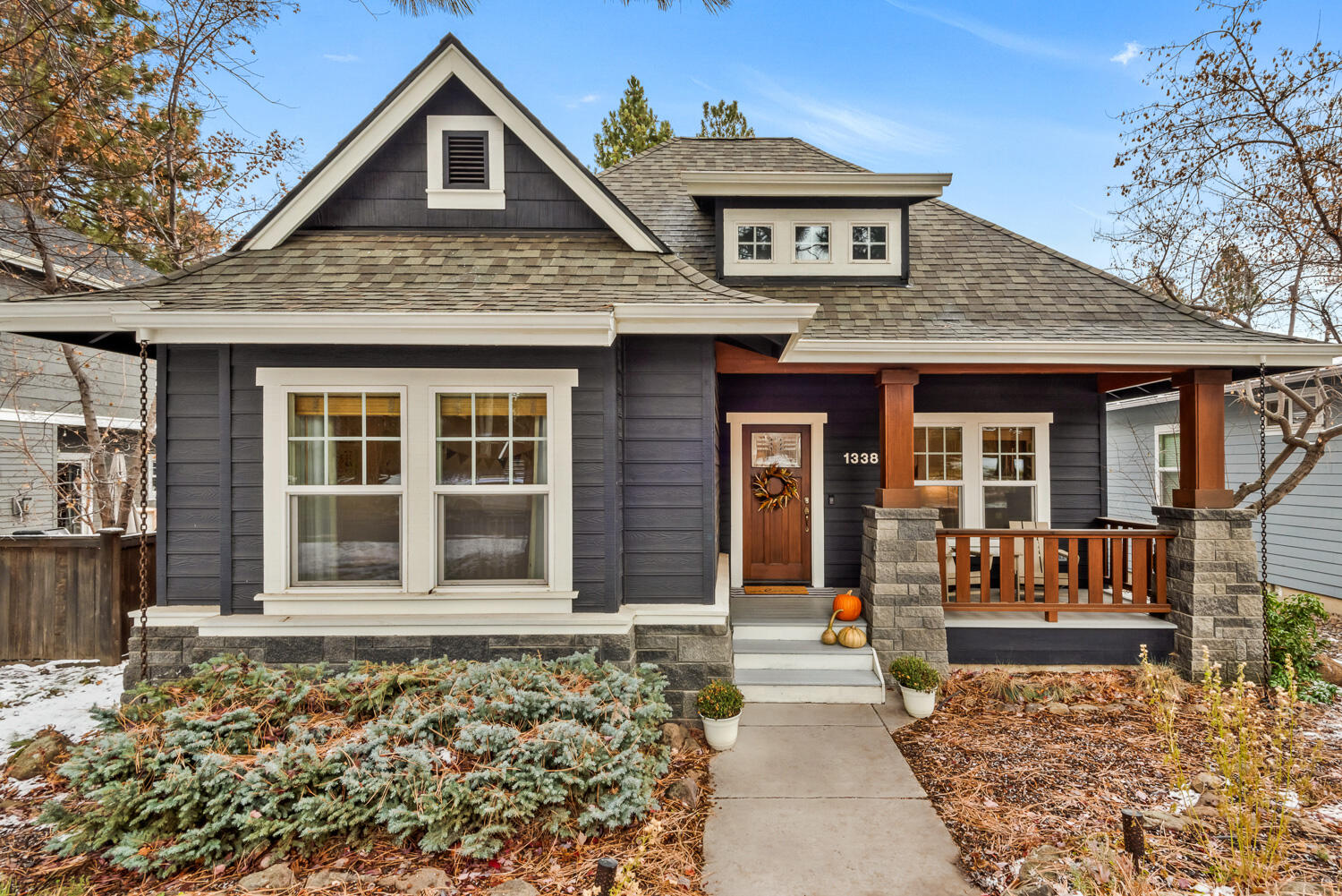 Ideally located just a few short blocks from Northwest Crossing's bustling central commercial district, this beautifully updated single level home was featured in NWX's Stroll Magazine & Bend Home & Design magazine for its recent charming professional redesign, thoughtfully conceptualized by Fishhouse Design Studio.  By retaining the original arches and craftsman feel but adding functional storage and custom features like handmade Moroccan-influenced tile, custom stained wood, and stylish, high quality fixtures, this home has a calming and peaceful ambience that is sure to appeal to the most discerning buyer.   Every detail was masterfully appointed to create a move-in ready experience for the new owners.  Low maintenance yard for ease of care.  Don't miss the huge lower level storage space accessed via the interior of the garage, currently being used as a home office.