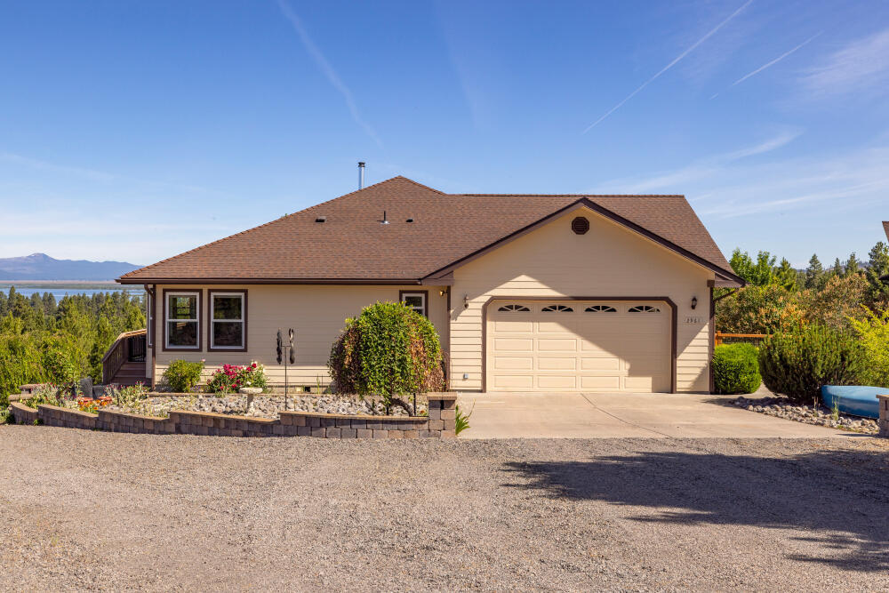 Soak in the sweeping views of Mt. McLoughlin, Pelican Butte, Agency Lake & Crater Lake Rim from this beautifully maintained 3BD/2.5BA home! Thoughtful layout with open-concept living, oak hardwood floors, soft-close cabinets, and a spacious primary suite with cedar-lined walk-in closet. Bonus: basement ready to be finished, also has plumbing ready for a bathroom with a separate entrance. generator backup, 500-gal propane tank, oversized 2 car garage. Completely fenced back yard and fiber internet. This home is a must see! Schedule your showing today