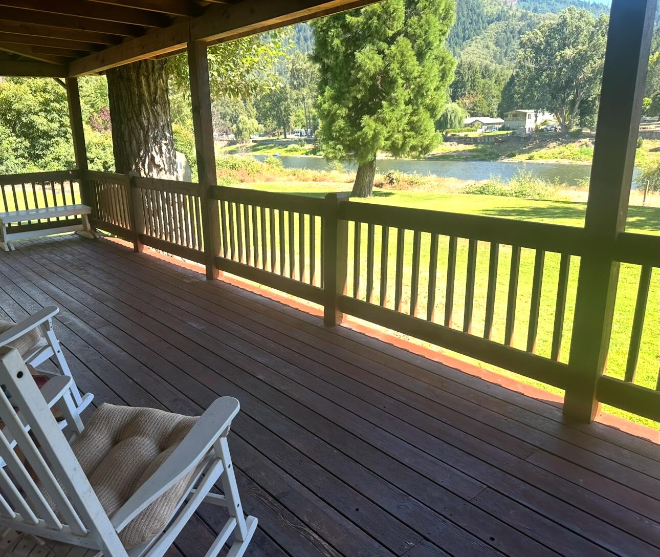 Looking for you own cabin get away on the beautiful Rogue River? This 443 sq. ft. cutie is a one bedroom, one bath cabin with an additional bunk house that sleeps four. Cabin has been updated in 2000. Bunk house is approximately 320 sq ft. which includes washer/dryer hook ups, one full bath and room to host guests. 
The wrap around deck offers amazing river views to relax or  entertain family and friends. . The .44 of an acre parcel is open and offers quick access to the river to fish, swim, float or raft.  This is a one of a kind get away! Schedule your own private showing. Won't last long!