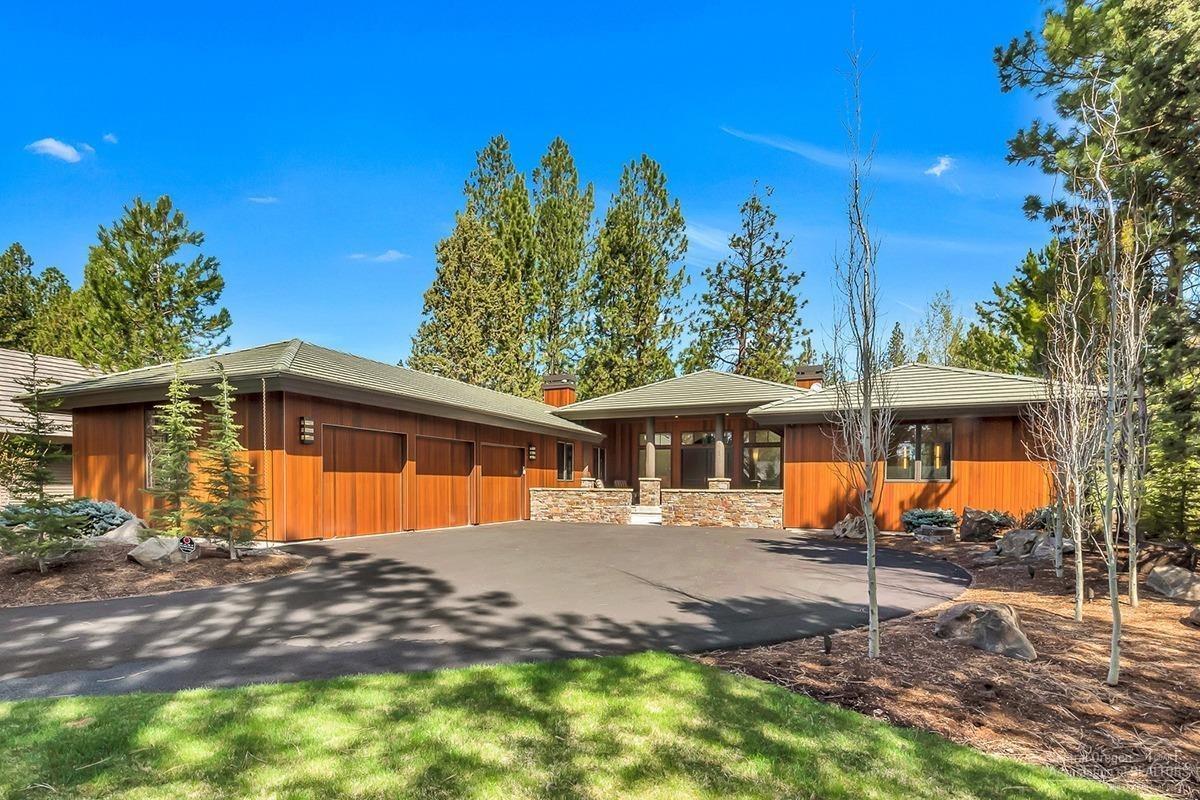 Exceptional single level in Broken Top. Prime location on the 3rd fairway offers privacy and a lovely view - no homes on the other side of the fairway! Home thoroughly remodeled in 2016, looks brand new. Hardwood flooring & teak cabinetry throughout entire home. Great room offers a vaulted ceiling w/ wood beams, handsome stone fireplace & large dining area. Kitchen features Alpinus granite counters & a huge island. Wolf range & micro, Sub Zero frig & wine frig, Miele dishwasher. Fireplace in kitchen makes it an ideal gathering spot in the home. Master has 2 walk-in closets & a barn door leading to a luxurious bathroom. Large den/office adjacent to master; 2 guest bdrms at other end of the home. 3rd bdrm has built-in bunks w/ 2 queen beds, each w/ twin beds above. Front & back covered patios are enclosed by low rock walls. Back patio wired for hot tub and has 3 gas connections for BBQ, heater or fire pit. Incredible curb appeal thanks to new landscaping, new driveway & new cedar siding!