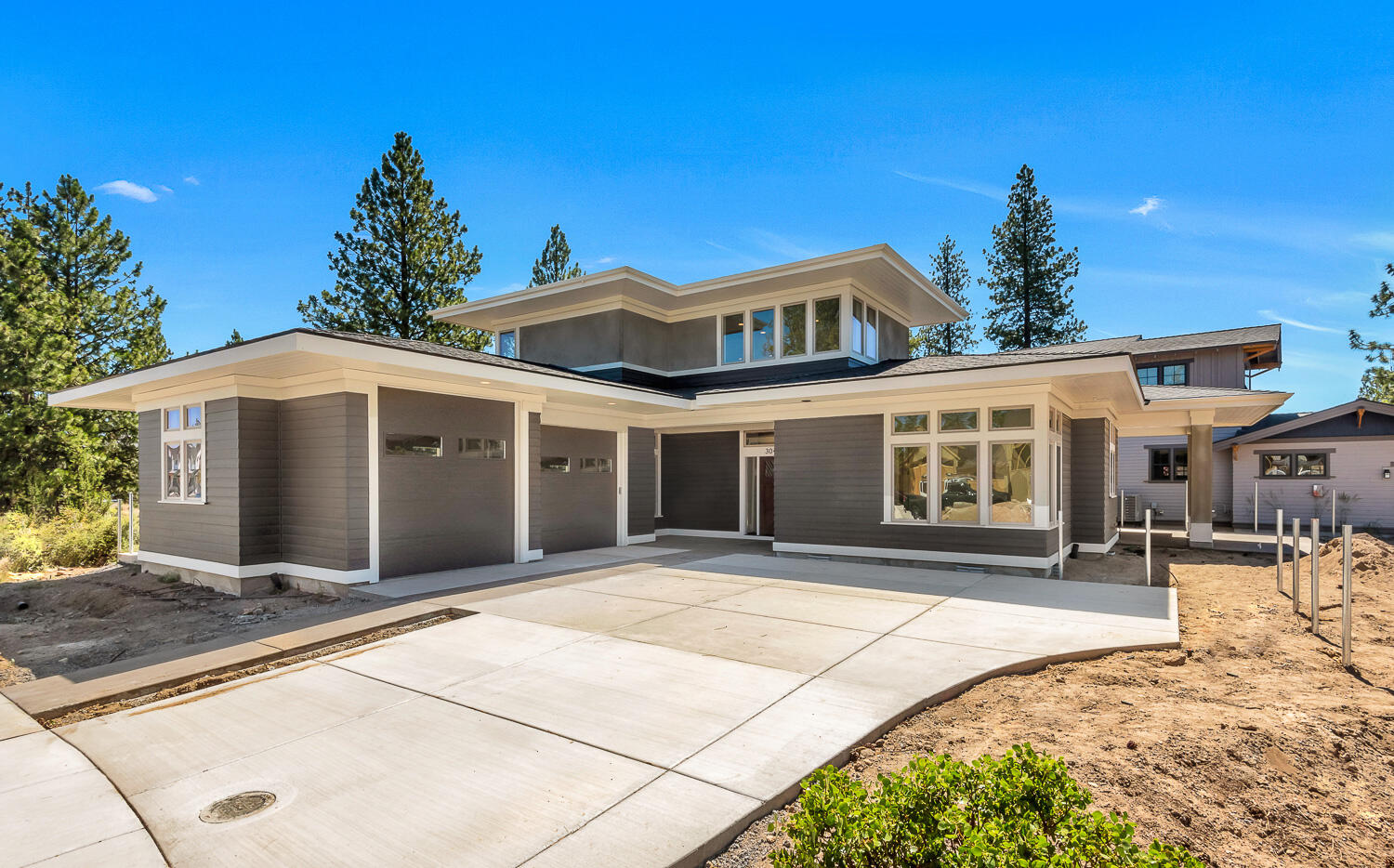 Stunning Discovery West home built by award winning collaboration of Greg Welch Construction & Muddy River Design.  Covered front porch opens to a welcoming foyer and great room engulfed in natural light. Kitchen features an exquisite stainless Dacor appliance package, slab quartz counters and custom cabinetry with soft-close doors/ drawers. Main level resident suite with curb less walk-in shower and walk-in closet. Main level also features an office/study with lots of natural light. Upstairs includes two guest bedrooms, full bathroom and loft area.  Oversized double car garage with ample storage, and one bay with a 10' door for flexibility to park taller vehicles. Discovery West, situated on 245 acres on Bend's westside, is the newest community by the developers behind the award-winning NorthWest Crossing neighborhood. The neighborhood will offer a variety of home types and sizes, as well as a community plaza and 40 acres of parks, trails and open land.