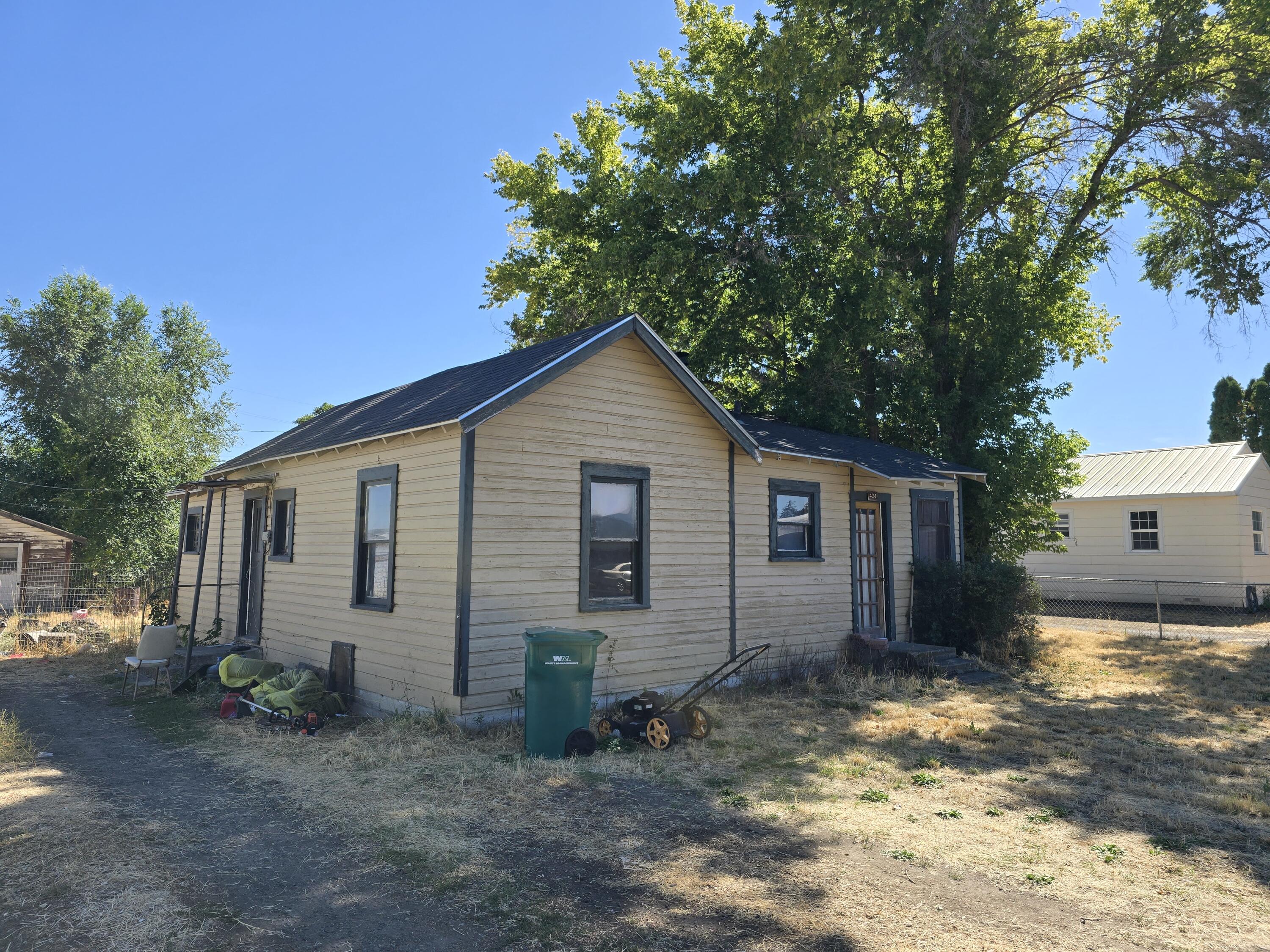 This 844 SF cottage in Merrill is considered a one bedroom, but has the ability for a second, with an extra space. This home has a newer pellet stove, newer hot water heater, large great room, large back yard, and most floors are original hardwood. This quaint home could be brought back with some tools and elbow grease! Home needs kitchen appliances, water is off. Wall heater exists but is non-operable, per seller.