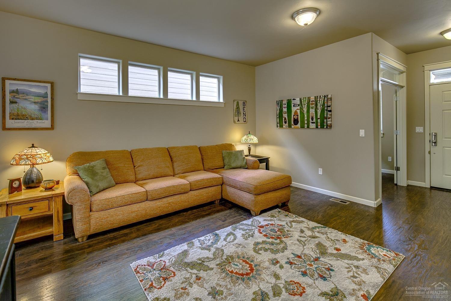 Enjoy this beautiful home located across the street from the private community pool, clubhouse, sports complex and play structure in The Bridges. Charming 3 bedroom, 2.5 bath home plus office is warm and welcoming. Kitchen is open to the Great Room & Dining, Gas range, tile counters with bar seating and a corner pantry. Up the extra wide staircase, all three bedrooms 2 full baths and laundry fit comfortably to complete this floor plan. 3 large widows in the hallway offer ample natural light upstairs. Master suite w/ space for a King bed set, dual sinks & a walk in closet. Great room plan is perfect for entertaining and extends outside to the fenced back yard and large stamped concrete patio. Home features 2 side yards. Gas forced air furnace & A/C.<span style=font-size: 10pt;=>Near schools & shopping yet tucked in a private community.Don't miss this wonderful home!</span>
