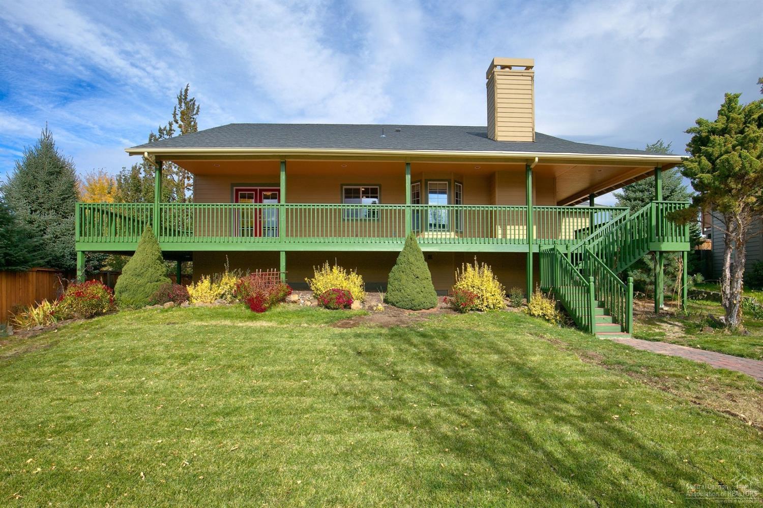 Updated single level on large lot! Vaulted living room w/gas fireplace and ceiling fan. Large open eat in kitchen with pantry and eating bar. Vaulted dining area w/French doors to access the deck and lots of windows for tons of natural light. Master w/deck access and updated bath with tile shower and double sinks. Functional and thoughtfully executed design leaves no wasted space! Large wrap around deck with mountain views. Attached 2 car garage. Large lot w/ RV parking & shed for storage. Access is off Boyd Acres to the garage and front of house, but you can park and access off Russell up the stairs. New roof & water heater in 2018.