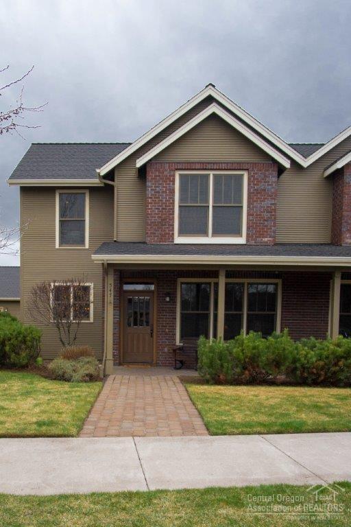 Enjoy your Sisters Get-Away in this Pine Meadow Village updated/quality condominium, close to downtown, trails, pool and tennis. Luxury details include hardwood and tile floors, Energy Star appliances, quality wood cabinets, stone countertops and much more. The 2 bed, 2 bath, 1560 sq.ft. floor plan has two living rooms and an office/den that could be your 3rd bedroom. Outdoor paver patio and upstairs deck with mountain views. Double garage with storage and nicely landscaped grounds maintained by the HOA.