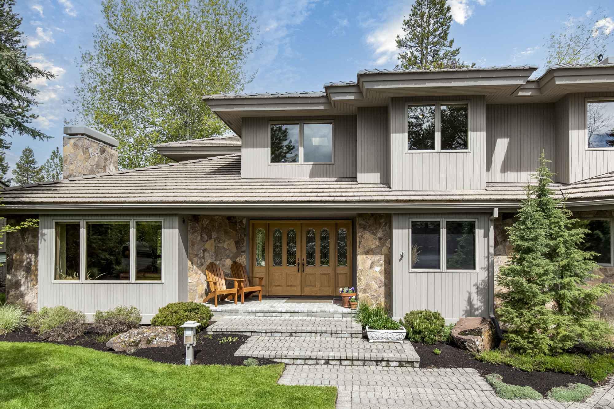 Imagine open views down the Woodlands Golf Course & Sunsets from your large back deck.  A sought-after Trophy Lane location in Sunriver Resort. This custom-built home is meticulously maintained & immaculate condition. White Oak HWF flow through the main level. The great room features a free-standing gas stove & wet bar w/ refrigerator. Spacious kitchen w/ granite counters, newer Electrolux & Bosch appliances, and casual eating area to take in the views. Or move to the more intimate living room & dining room area to enjoy a 2nd fireplace & more views. Main level offers guest bedroom w/ adjacent full bath. Upstairs features a spacious loft area perfect for reading, hobby/exercise space. Primary suite offers nice GC view & private deck! Two add'l guest bedrooms w/ Jack n' Jill bath complete the upper level. 1/3 acre lot beautifully landscaped w/ sprinklers. Newer hot tub. Oversized 3.5 car garage. Furnished. Tile roof, A/C, Central Vac. Paver parking, circular driveway. SHARC Paid!