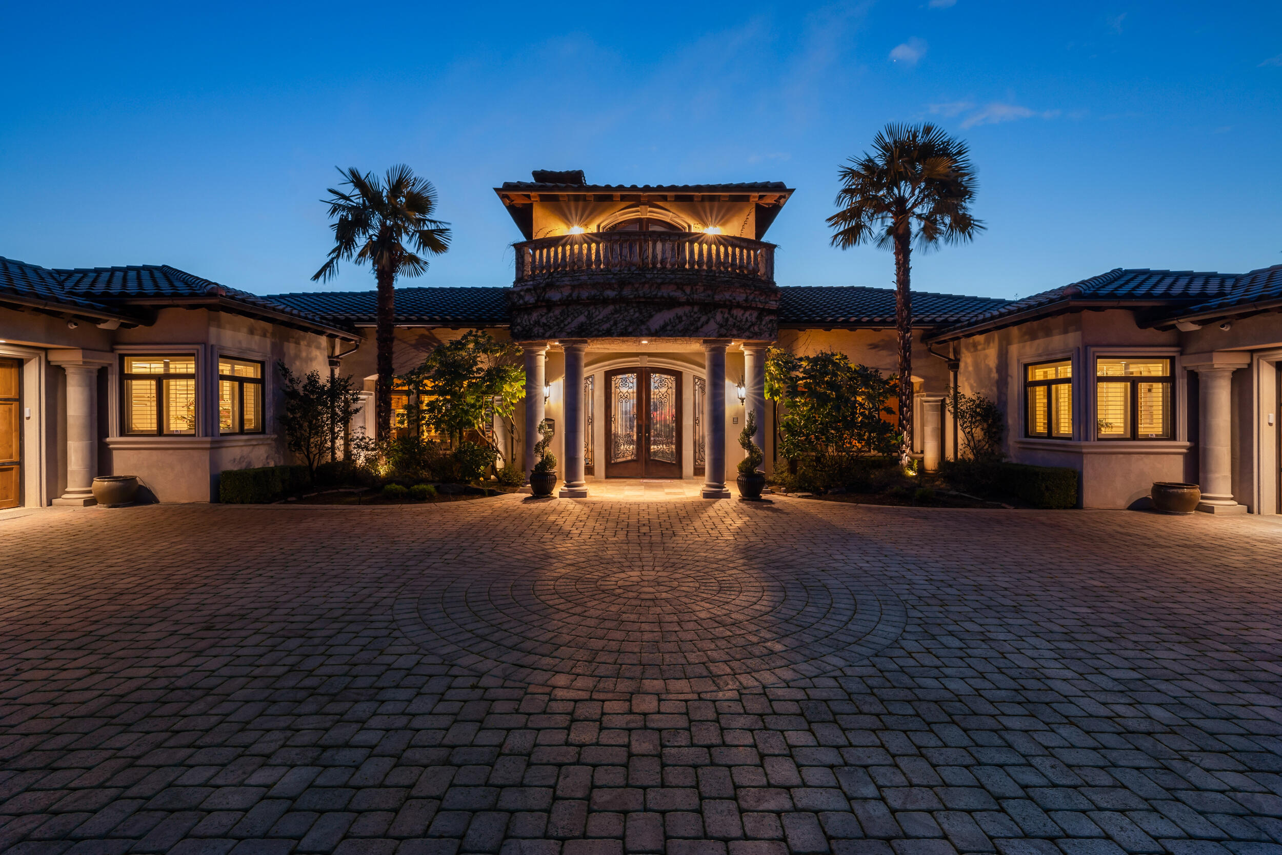 Major Price Improvement!!! Seller is motivated and ready for a quick sale--Don't miss this opportunity! All offers considered! ~~Exquisite European-style estate built by Mike Pagnini for himself, showcasing unparalleled craftsmanship and detail. This fully furnished masterpiece features 4 luxurious primary suites, including a grand main suite with fireplace and spa-like bath with steam shower. Also features 6 fireplaces, a chef's kitchen, office/library, game room with 5-seat bar, custom wine cellar, 12-seat theater with bar seating, home gym, 2 laundry rooms, elevator, security system, and 72 speakers. Outdoors, enjoy upper and lower patios with breathtaking city and valley views, an outdoor kitchen with built-in BBQ, pavilion with fireplace, heated Grecian-style pool and spa with spillway waterfall, lush landscaping, and a putting green. A one-of-a-kind estate designed for refined living and grand entertaining. Plus so much more! See full list of amenities in attached document.