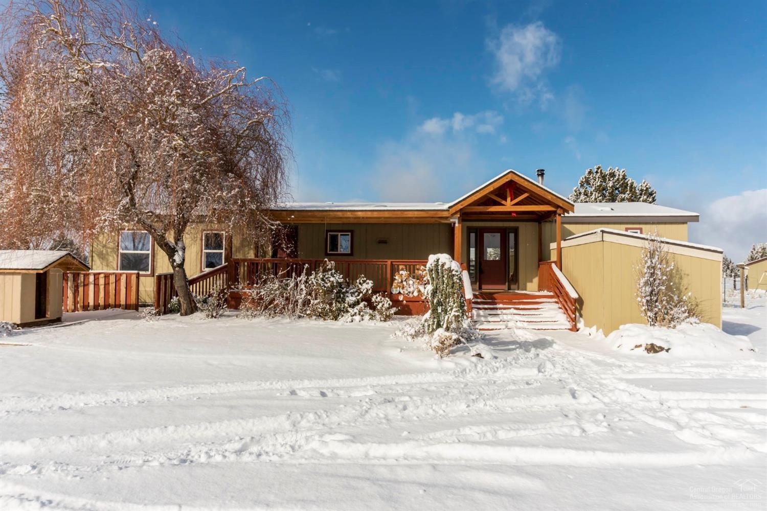 Horse Property-5-acre piece of heaven! Stunning Cascade views from this mini-horse-ranch! Fenced/cross-fenced, w/round-pen & multiple pastures, shelter, hay storage & tack room for the animals. Serviced by well and has a drip system for flower garden. Wood shelter just off the deck makes stoking your Jotul wood stove a snap. Covered deck provides a serene spot to stop & enjoy a cup of tea. Large, open floor plan & newly remodeled kitchen will be a joy to come home to. Come on out & bring your critters!