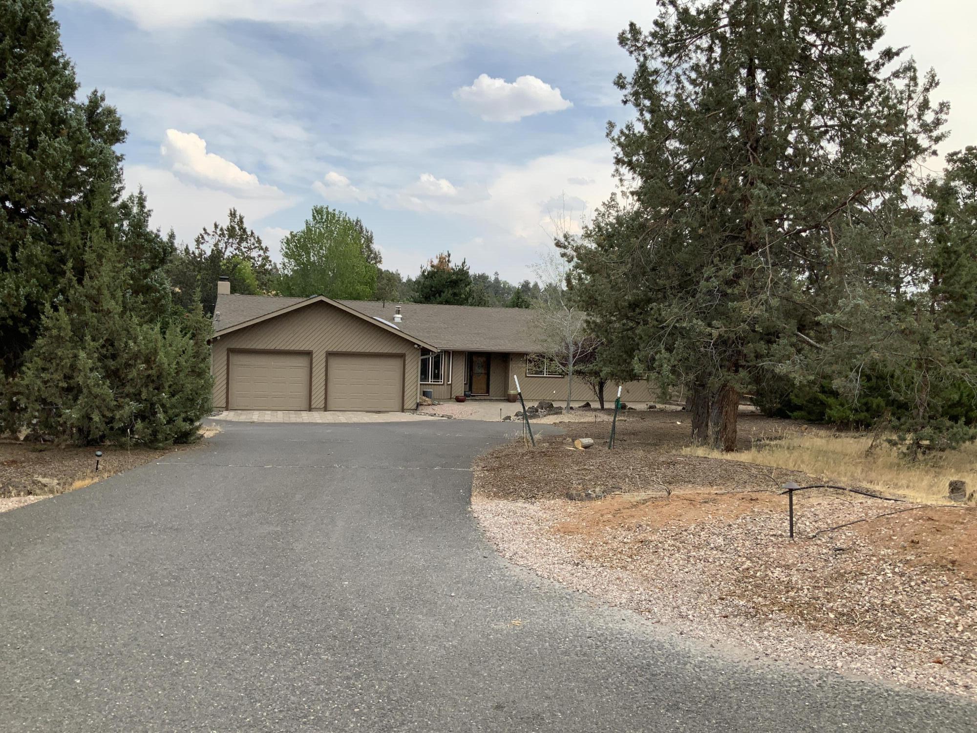 This expansive property overlooking an indigenous ridge is a wonderful find in stunning Deshutes  County. Boasting new flooring throughout and recently  updated bathrooms, new water heater and a fresh professional cleaning...you MUST come check this welcoming home out. 
The interior has LVP flooring, ceiling fan, SS appliances, a propane stove for cozy winter days and the furnace and AC were installed in 2018. 
Outside the grounds area you will find a large covered patio to relax under along with the lovely water feature, a drip sprinkler system throughout and the back yard is served with its own sprinkler system . Large shop invites all kinds of trade work, hobby and crafts, toy storage and more. RV/Vehicle cover stays. 
Schedule your own private tour and you won't be disappointed.
