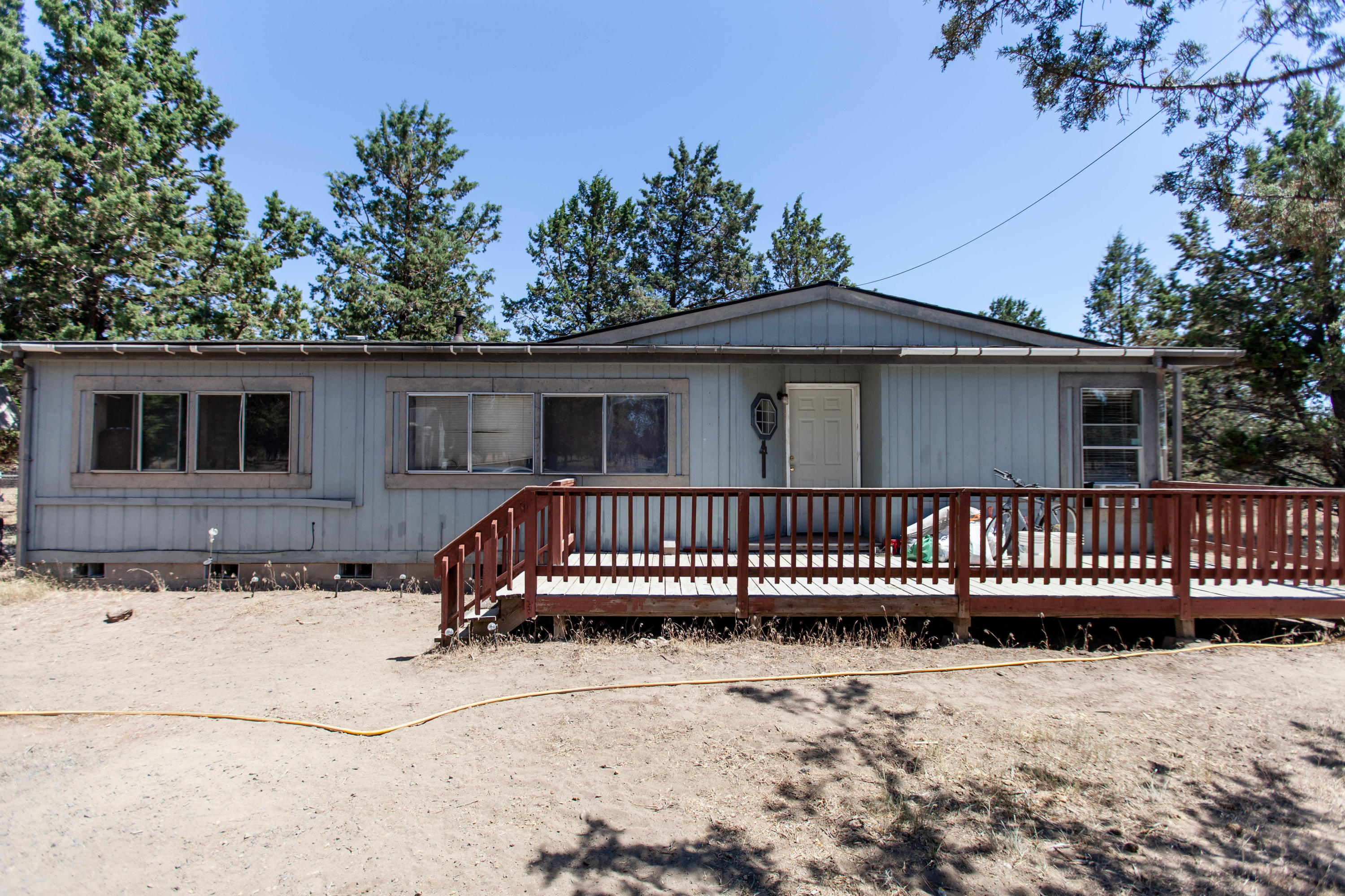 Cute piece of horse property in Crooked River Ranch. Home sits at 1296 sqft. with three bedrooms and two bathrooms and land is a boastful 5.5+ acres. Land is level and ideal for horses – partial set-up already in place. Property sold as-is.