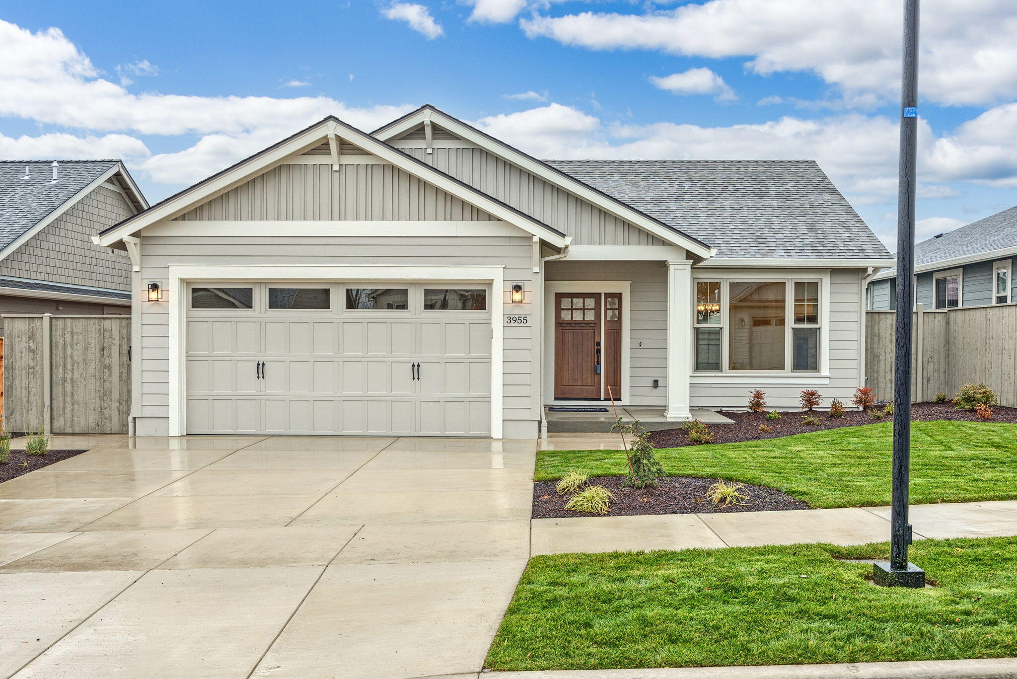 New Construction by Mahar Homes, Inc. Beautiful single-level Craftsman in one of East Medford's most desirable neighborhoods. High-end finishes include hardwood floors, quartz countertops, vaulted ceilings, custom cabinetry, Heat & Glo gas fireplace with custom mantel, tile showers, wide baseboards, wood-wrapped windows, and Hunter Douglas blinds throughout. Milgard windows, Hardie Plank siding, tankless water heater, and spacious patio. Fully landscaped and fenced. Earth Advantage Certified. Listing agent is related to seller.