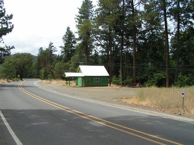 Rare Commercial Property in the Applegate Valley! Centrally Located, and with Applegate River Frontage! Already a well-known River Destination on the Applegate, this Property is perfectly poised to embrace the ever-growing popularity of the Applegate Valley's Local Artisan's Wineries, and Farmers. Generous Zoning allows for Residential Use, as well as numerous Commercial possibilities including Farm Stand, Local Artisan's Store, Vineyard/Wine Stand/Store, Tasting Room, Retail, and more. Existing Older Building, with Well, Septic, and Power on Site. Plenty of Parking, with easy access from Hwy 238 and excellent traffic exposure Don't miss this very unique opportunity in a special location!