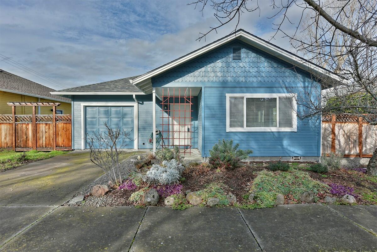 Sweet single level home in desirable Ashland neighborhood. Near so many amenities like the Grower's Market, schools, 40-acre creek side nature park with ball fields and playground. Easy distance to downtown Ashland too. The home has an open floor plan – open living room with picture windows, kitchen and dining room. Large, fenced rear yard with planter boxes and lots of room for gardening. You will love this quiet and charming neighborhood with level streets and well-cared for homes. Single car attached garage.