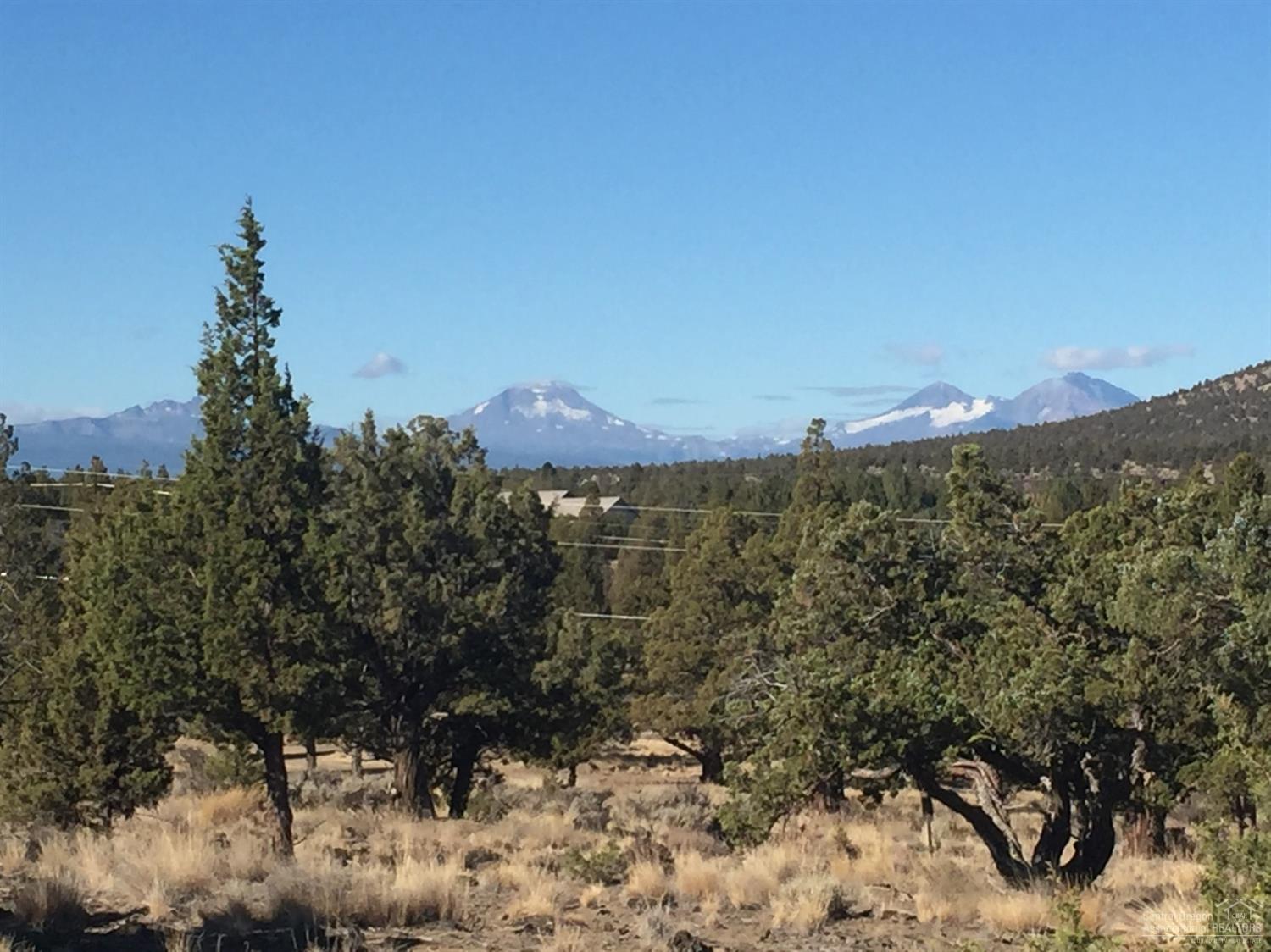 Enjoy sweeping views of the Three Sisters and Broken Top Cascade Mountains. Amazing .51 acre level lot located behind the gates on the Resort side of Eagle Crest. Excellent location on private cul-de-sac. Use any builder you wish. Eagle Crest is home to three 18 hole golf courses, three sports centers, a day spa and miles of trails.