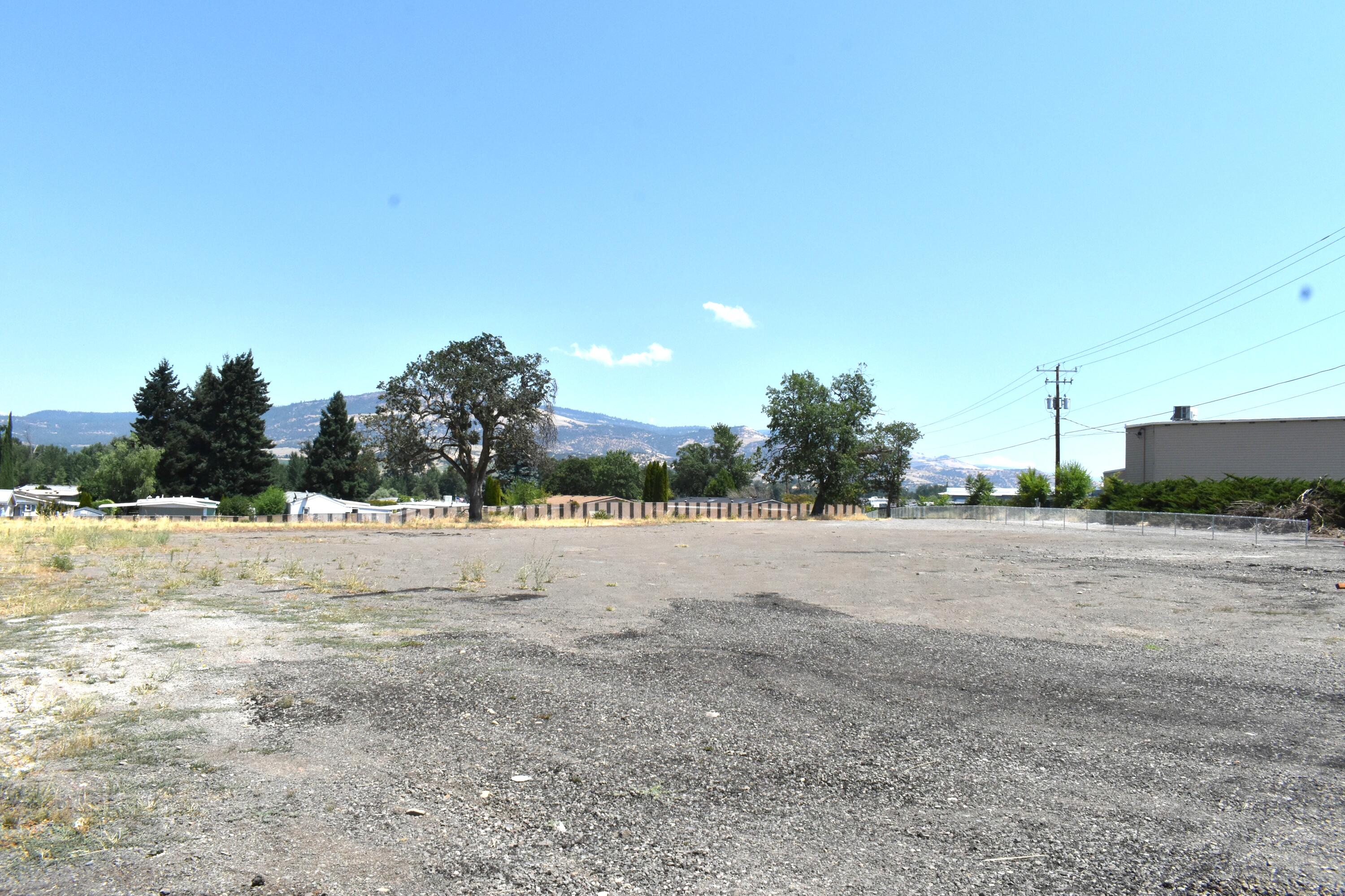 Discover the many uses of this high visibility and conveniently accessible 1.28-acre commercially zoned lot ideally situated between Phoenix and Medford, Oregon. This prime parcel is perfectly positioned for multifamily residential, retail, or mixed-use development. Capitalize on the region's rapid growth and rising demand for contemporary living and retail amenities. With its strategic location and flexible zoning, this lot offers an exceptional opportunity for investors and developers looking to meet the needs of a thriving community. Don't miss your chance to be part of Southern Oregon's expanding future.