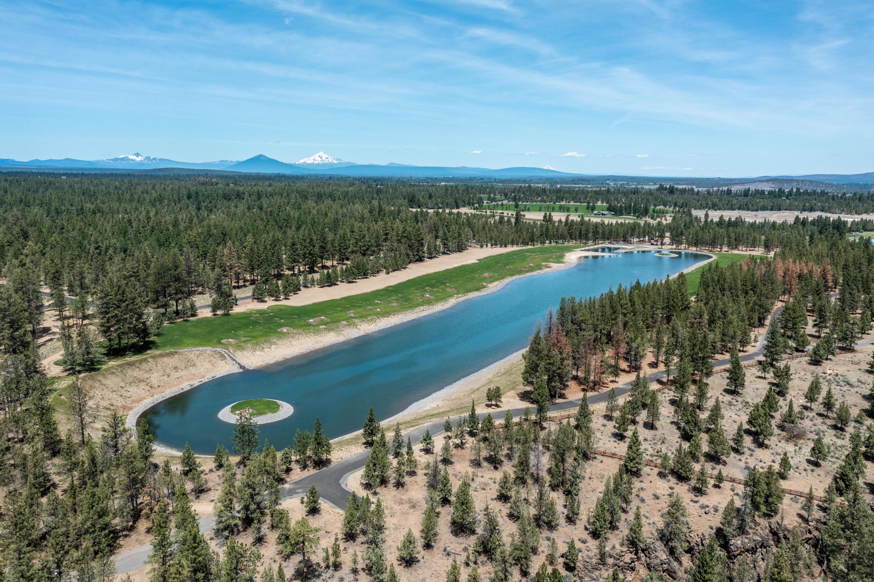 Introducing TANAGER. Central Oregon's first and only boutique, waterfront residential community, Tanager offers a unique opportunity to live where you play. Located in Bend's desirable west side and just six miles from downtown, Tanager is a private 21-lot, 182-acre residential community with expansive homesites, all waterfront, stretching along the shores of two exclusive lakes and Tumalo Creek. Life at Tanager centers around outdoor recreation, offering sports enthusiasts, water skiers and wakeboarders an incredible opportunity to enjoy a dedicated waterfront lifestyle. Residents have exclusive access to Tanager's two private lakes - one dedicated to non-motorized activities and the other a regulation water ski and wakeboard lake, as well as nearly 3/4 mile of private waterfront on Tumalo Creek. A vast network of trails traverses the property, offering residents a chance to explore more than 117 acres of recreation and preserved wildlife habitat. A once in lifetime legacy property.