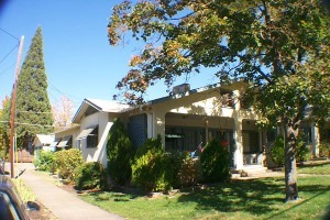 Charming Eastside 4-plex, in great location. Non-conforming use on SFR-6 lot, .28 acres with big trees, mature landscaping; rents have been $550 since 1993. Near zero vacancy in these charming 2 + 1 stucco beauties built in 1925. Fireplace, built-ins, FA/GAS heat, and garages. No showings. Make offer contingent on inspection of units and records.