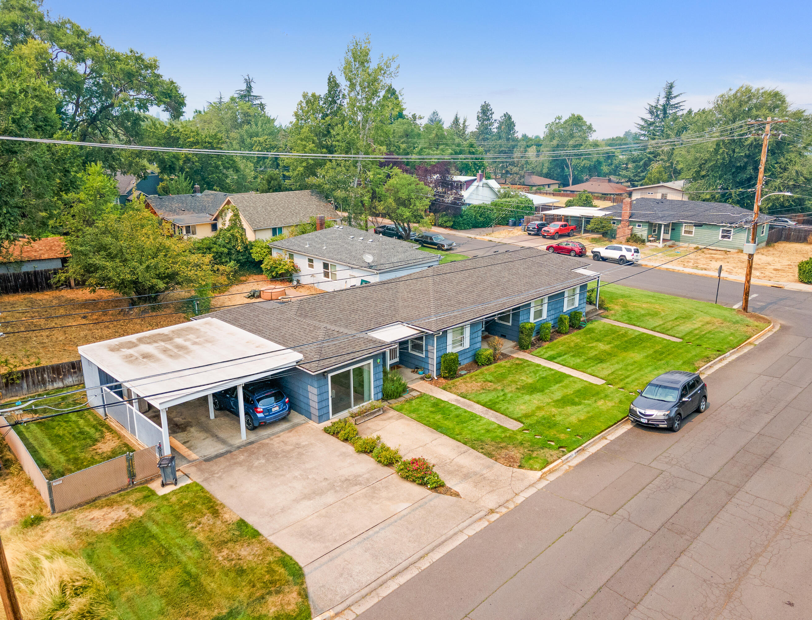 Attention all investors!!! Looking for an immaculate triplex in the heart of Ashland? If so, this is the one for you! Built in 1958, but has been renovated throughout the years with updated appliances, hot water heaters, flooring, roof (installed in 2019), sewer clean out (installed in 2017), and much more! Two units are currently occupied with month to month tenants paying $1025 and $1150 per month and one unit being vacant, could make this the perfect Air B&B opportunity for the next owner! Tenants pay their own electric, garbage, and internet and owner pays for water, sewer, and landscaping keeps the expenses low! Totaling at 2086 sq ft, this spacious property allows ample space for each unit and features open floor plans as well! 2 car carport w/ additional storage available for the tenants use. Owner carry terms available with a minimum of 30% down and 5 year payoff! This one won't last long, so contact your agent today for a personal tour, before it's too late!!