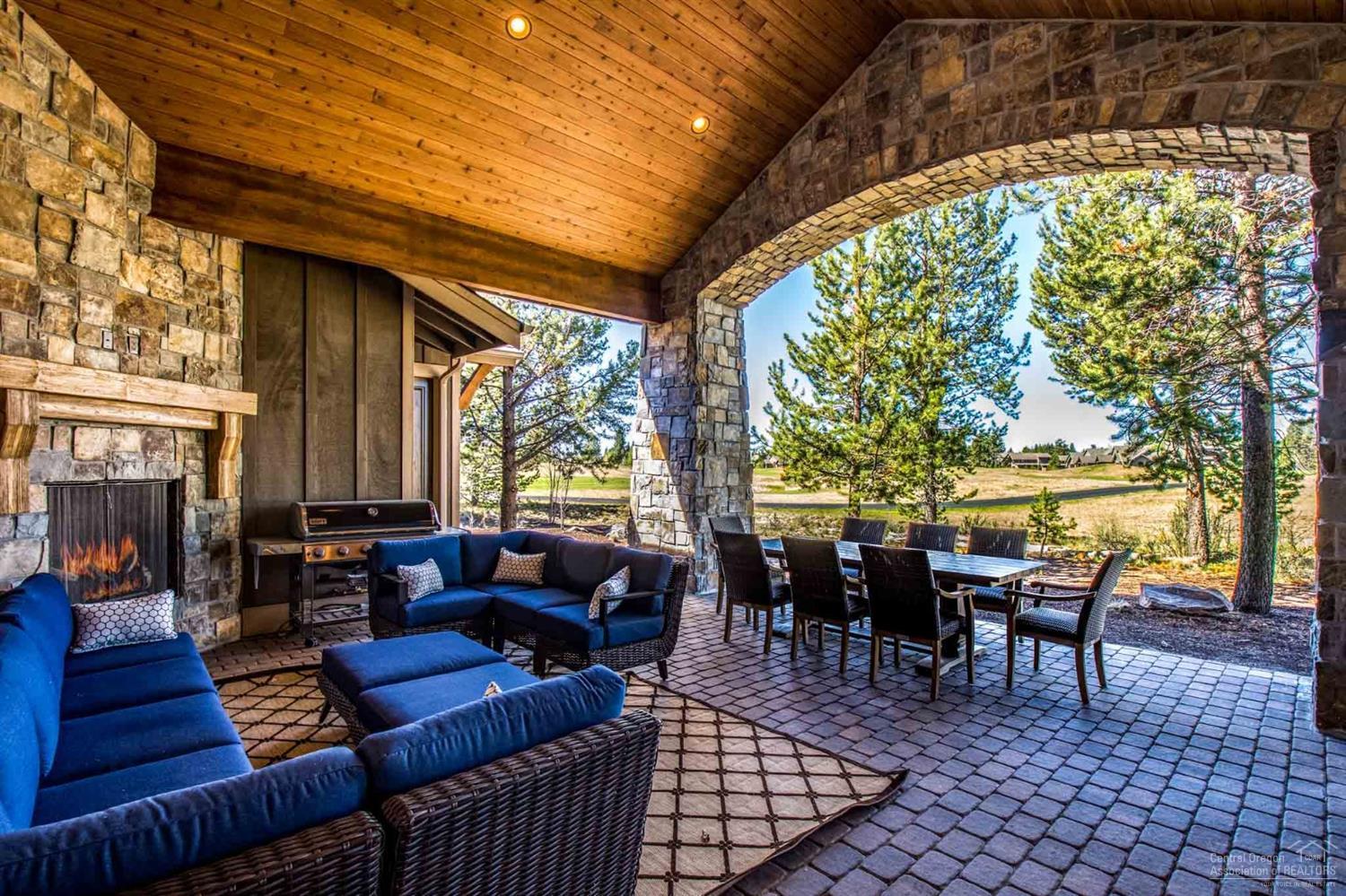 Breathtaking Caldera Springs home with golf course views. This beautifully designed property come fully furnished with tasteful decor throughout. Invite your friends and family to come enjoy the outdoors where you can lounge on the comfortable patio furnishings while the exterior fireplace roars, or bring the gathering inside to the spacious great room. Extraordinary wall of windows in the living room allows for great natural light to pour in while overlooking the beautifully maintained links course. On the ground level you will find one master suite with a gas fireplace, 2 junior suites, the great room, utility room, half bathroom, covered paver patio and hot tub. Upstairs are two more beautiful suites, one with a Mt Bachelor view and a super fun bunk bed/family room. Home is located near many amenities of the Resort- spectacular infinity edge swimming pool, fitness center, tennis courts, Zeppa Italian Restaurant, golf course, lakes and more!