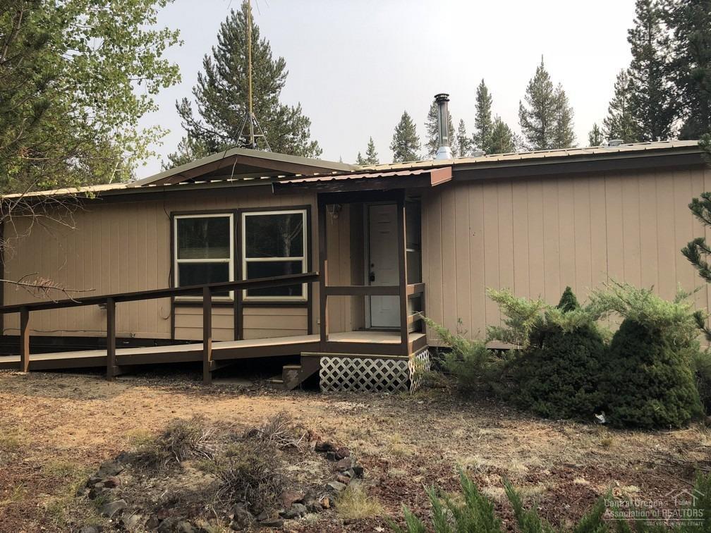 Priced to sell! This well-maintained 3 bedroom home on 1.25 acre lot features tons of storage for your toys with a detached 2 car garage, additional shop/barn, and a detached apartment. Enjoy nearby recreation opportunities including lakes and national forest just minutes away!